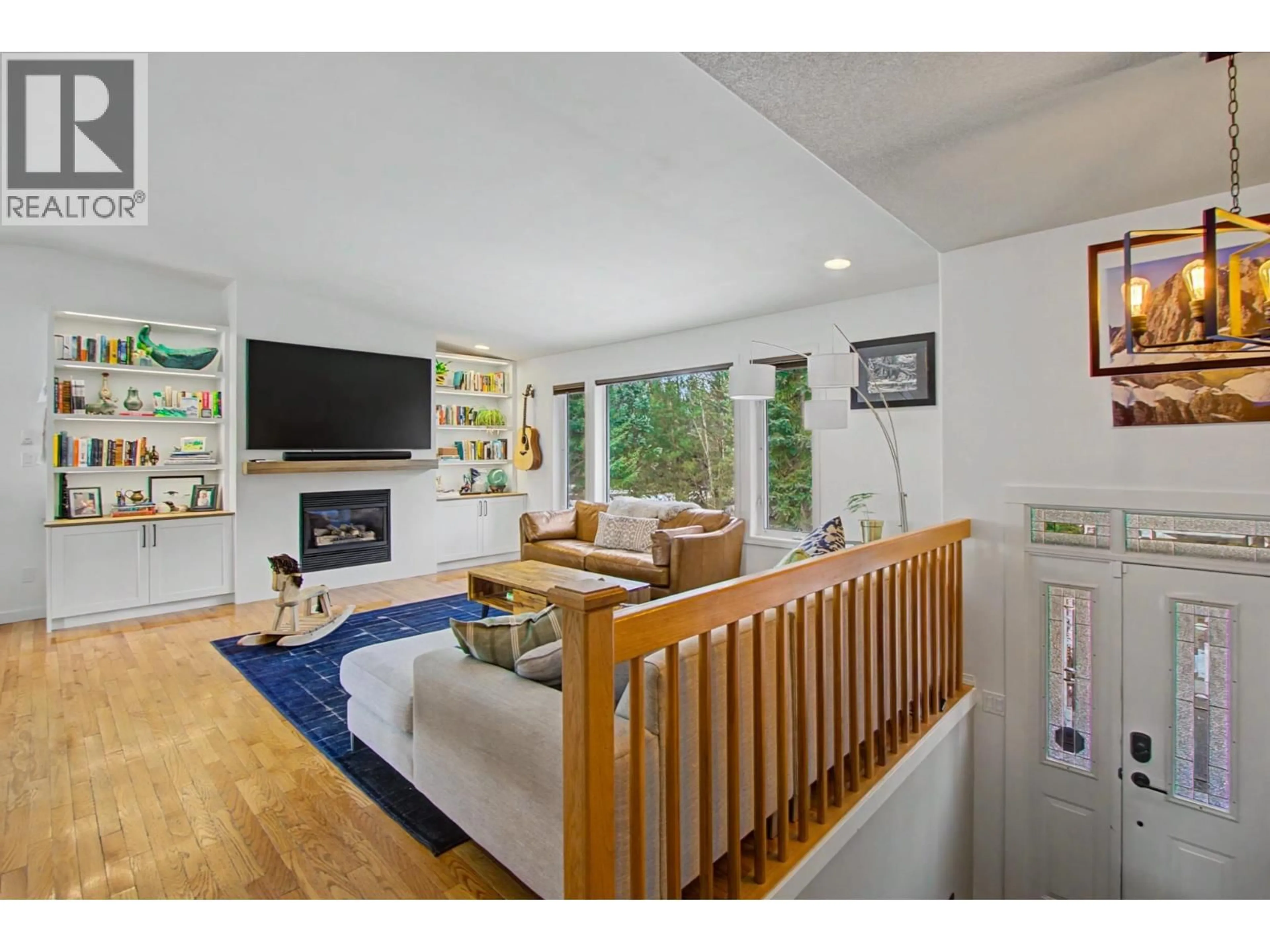Living room with furniture, wood/laminate floor for 6655 NORTH NECHAKO ROAD, Prince George British Columbia V2K4Z4