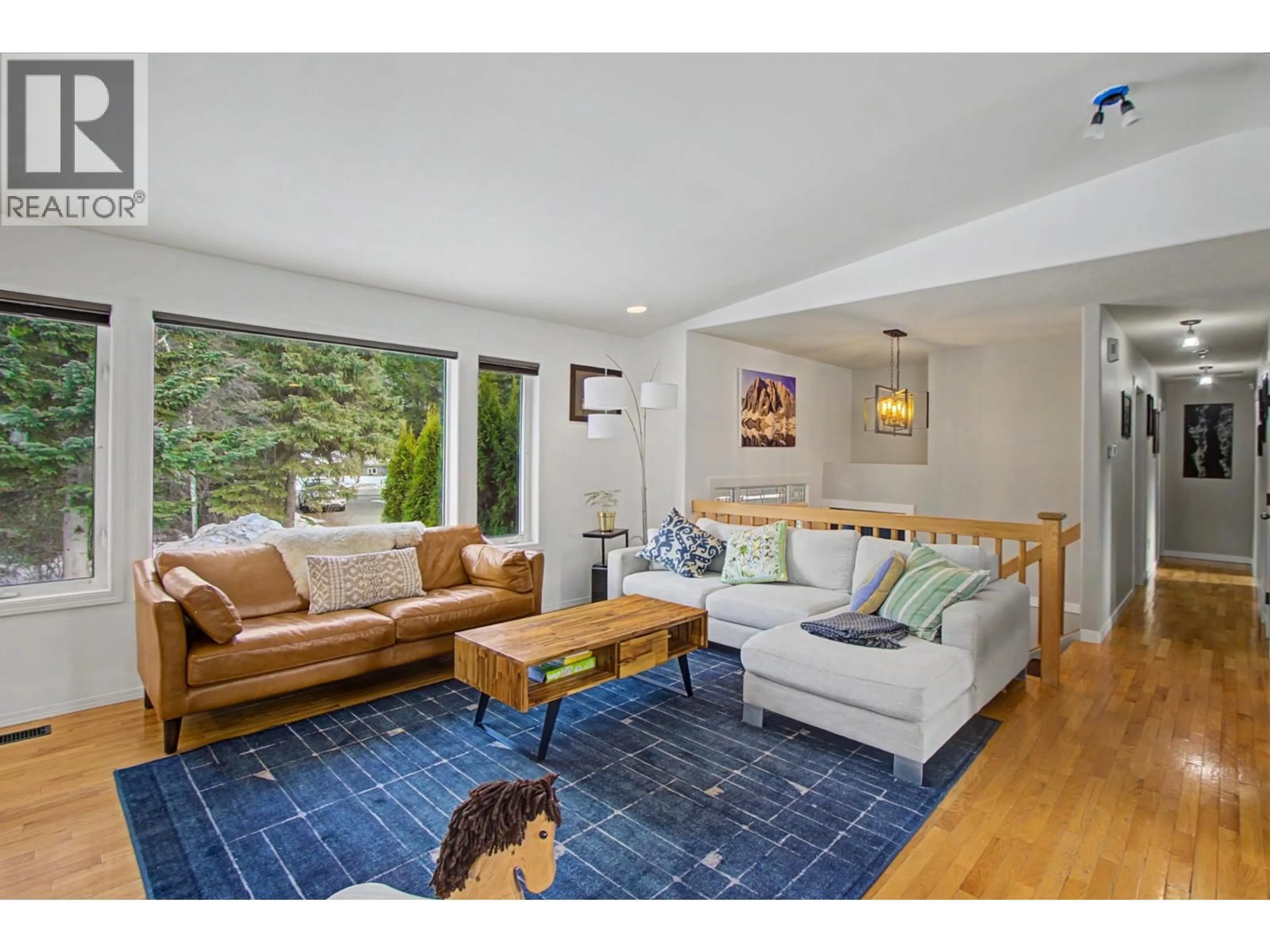 Living room with furniture, wood/laminate floor for 6655 NORTH NECHAKO ROAD, Prince George British Columbia V2K4Z4
