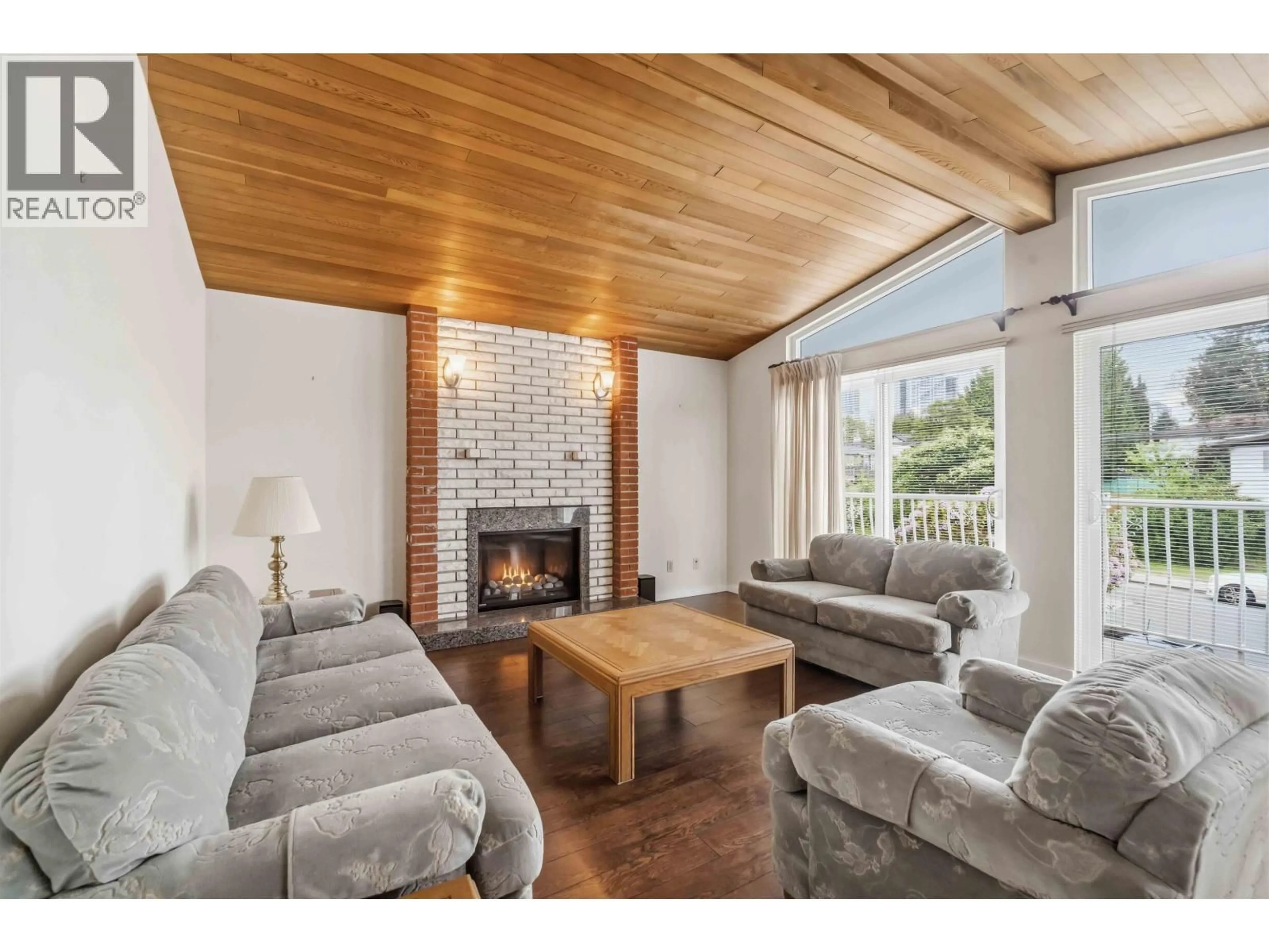 Living room with furniture, wood/laminate floor for 6895 MCKAY AVENUE, Burnaby British Columbia V5J3R9