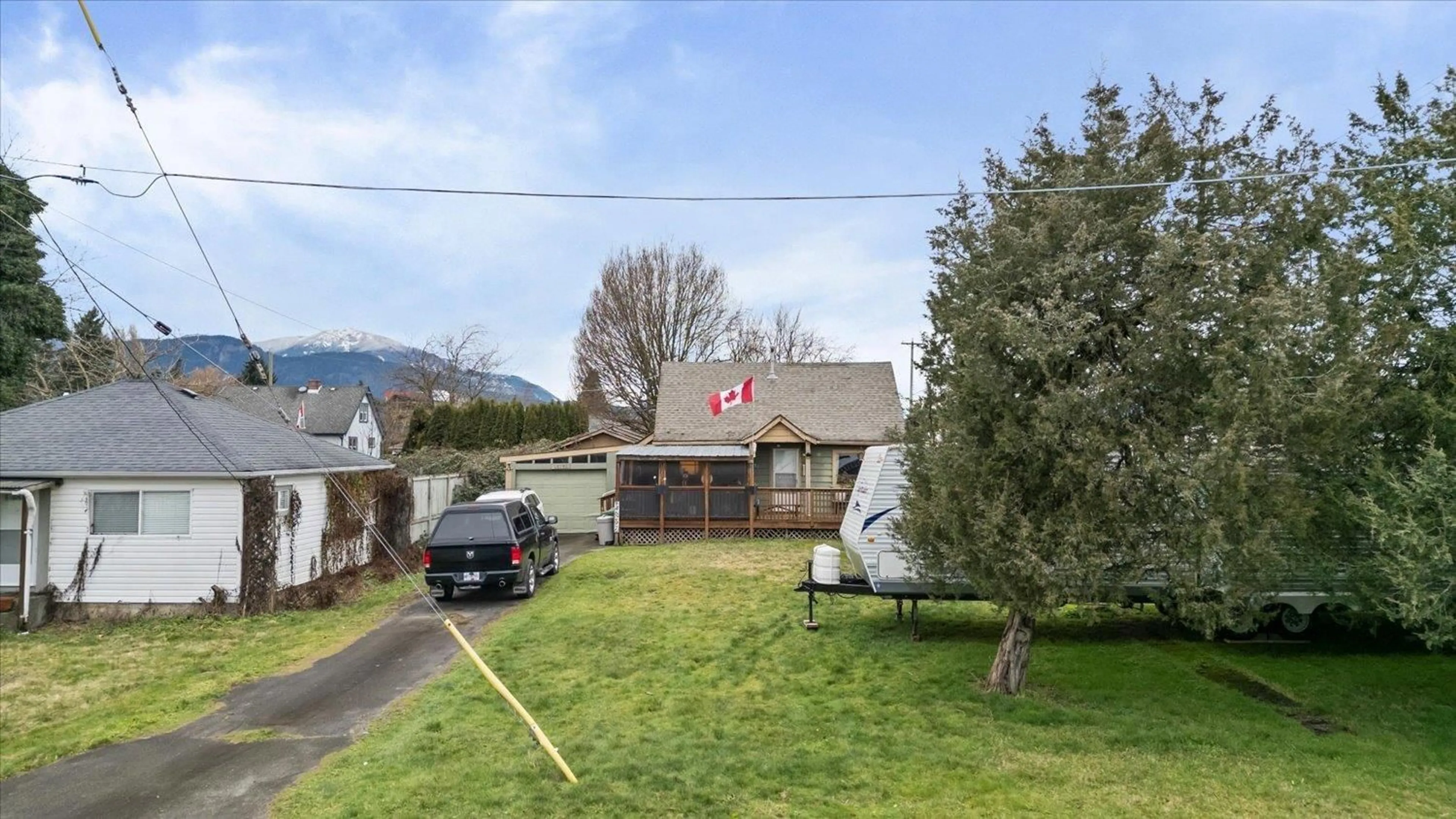 A pic from outside/outdoor area/front of a property/back of a property/a pic from drone, mountain view for 46297 GORE AVENUE, Chilliwack British Columbia V2P2A2