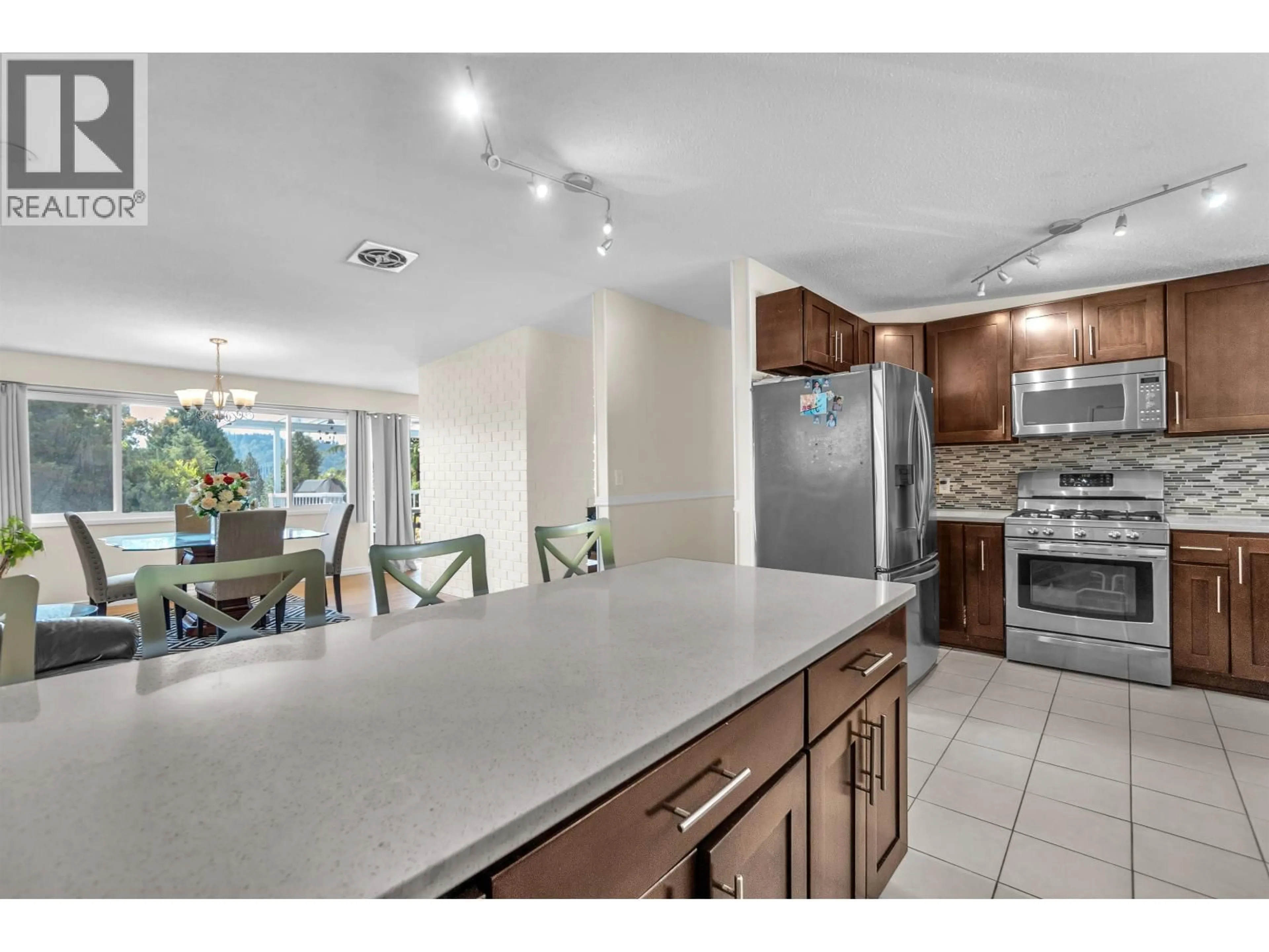 Open concept kitchen, ceramic/tile floor for 693 PLYMOUTH DRIVE, North Vancouver British Columbia V7H2H5
