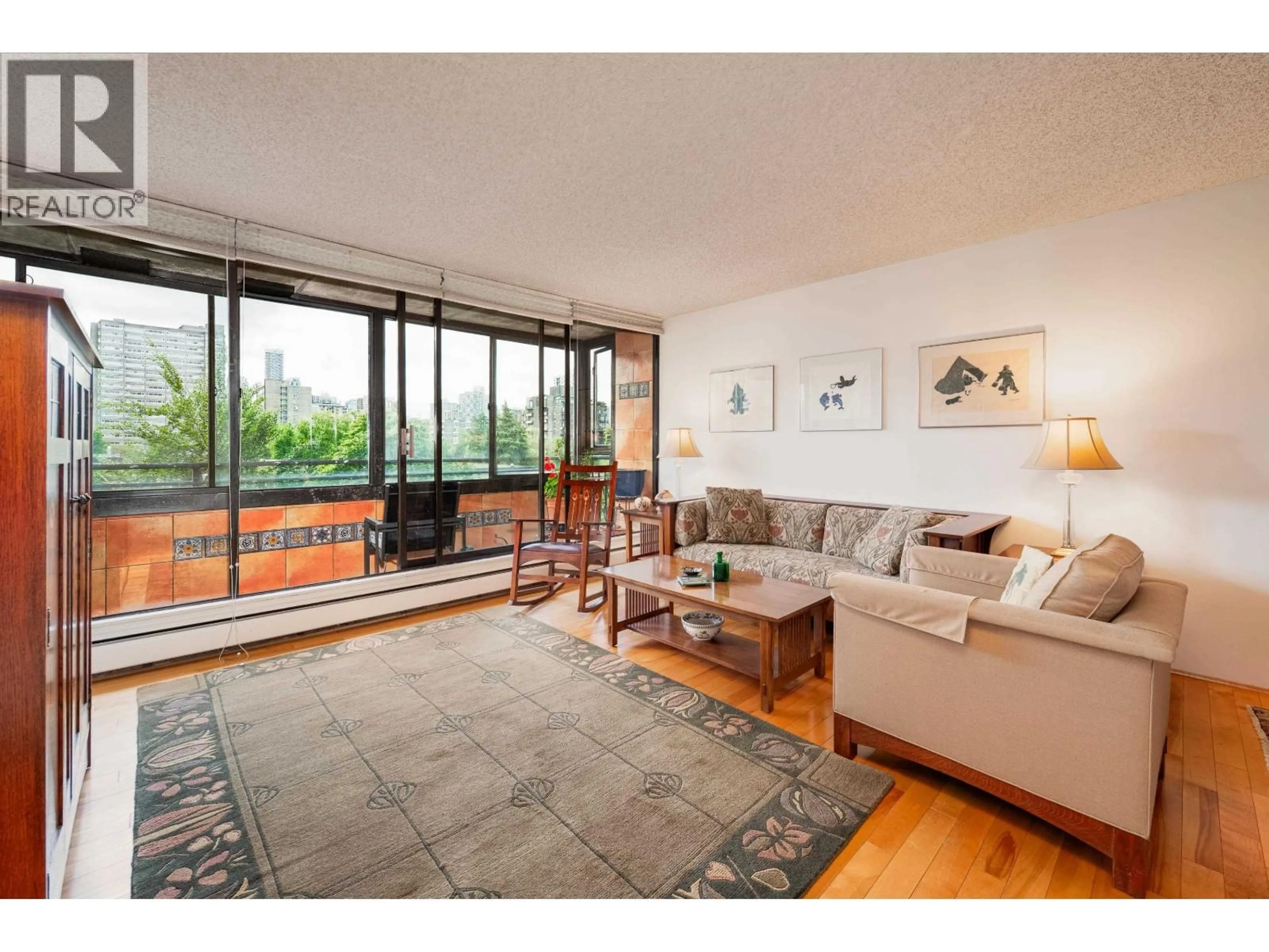 Living room with furniture, unknown for 602 - 1816 HARO STREET, Vancouver British Columbia V6G2Y7