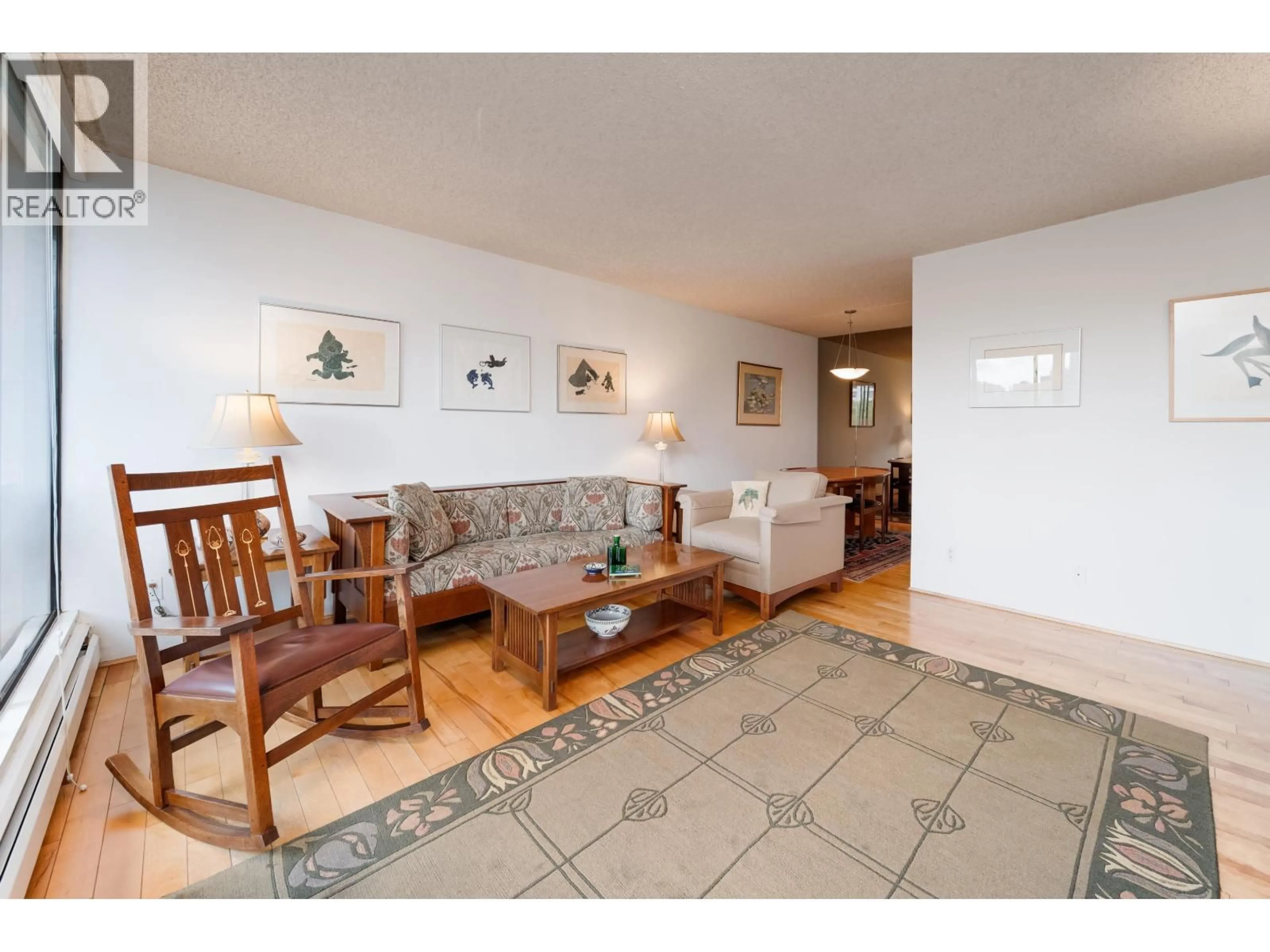 Living room with furniture, unknown for 602 - 1816 HARO STREET, Vancouver British Columbia V6G2Y7