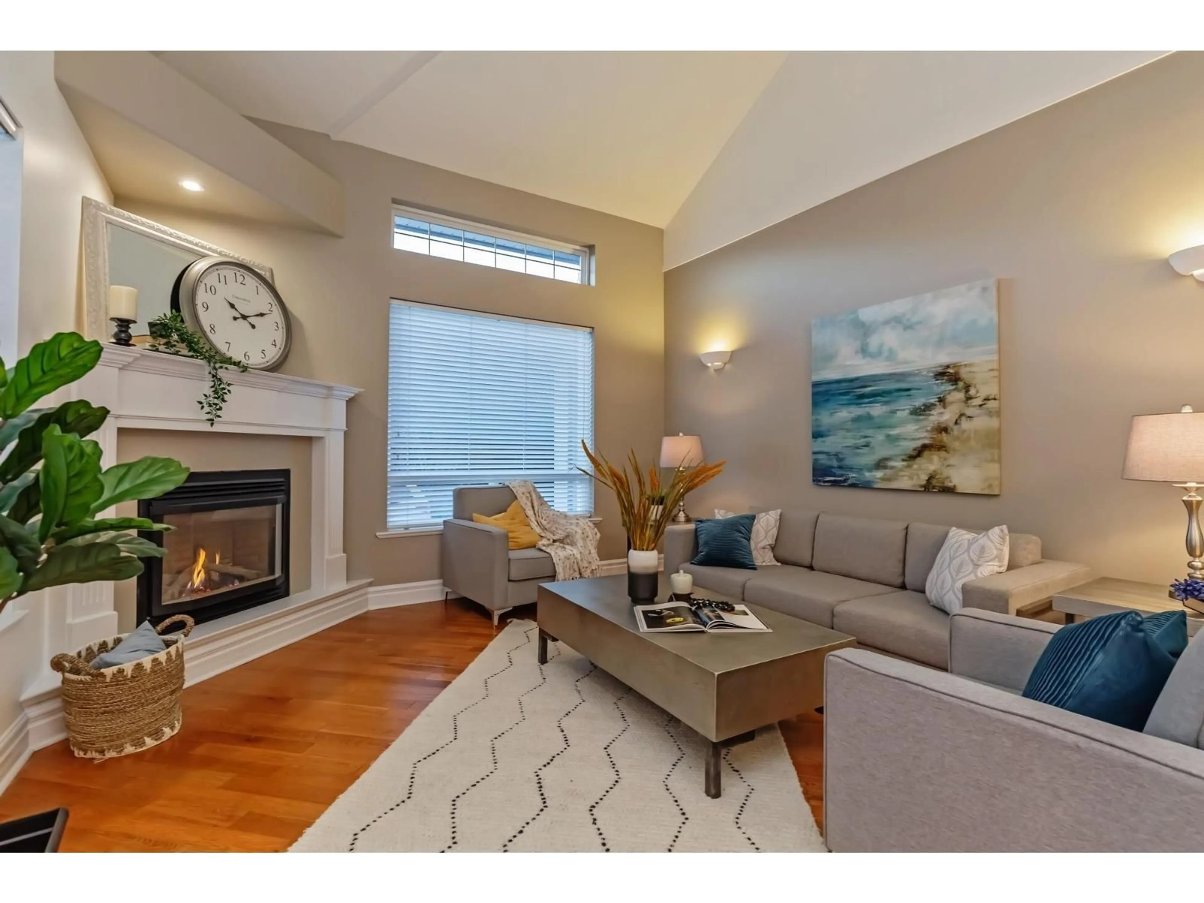 Living room with furniture, wood/laminate floor for 34743 PAKENHAM PLACE, Mission British Columbia V2V7A6