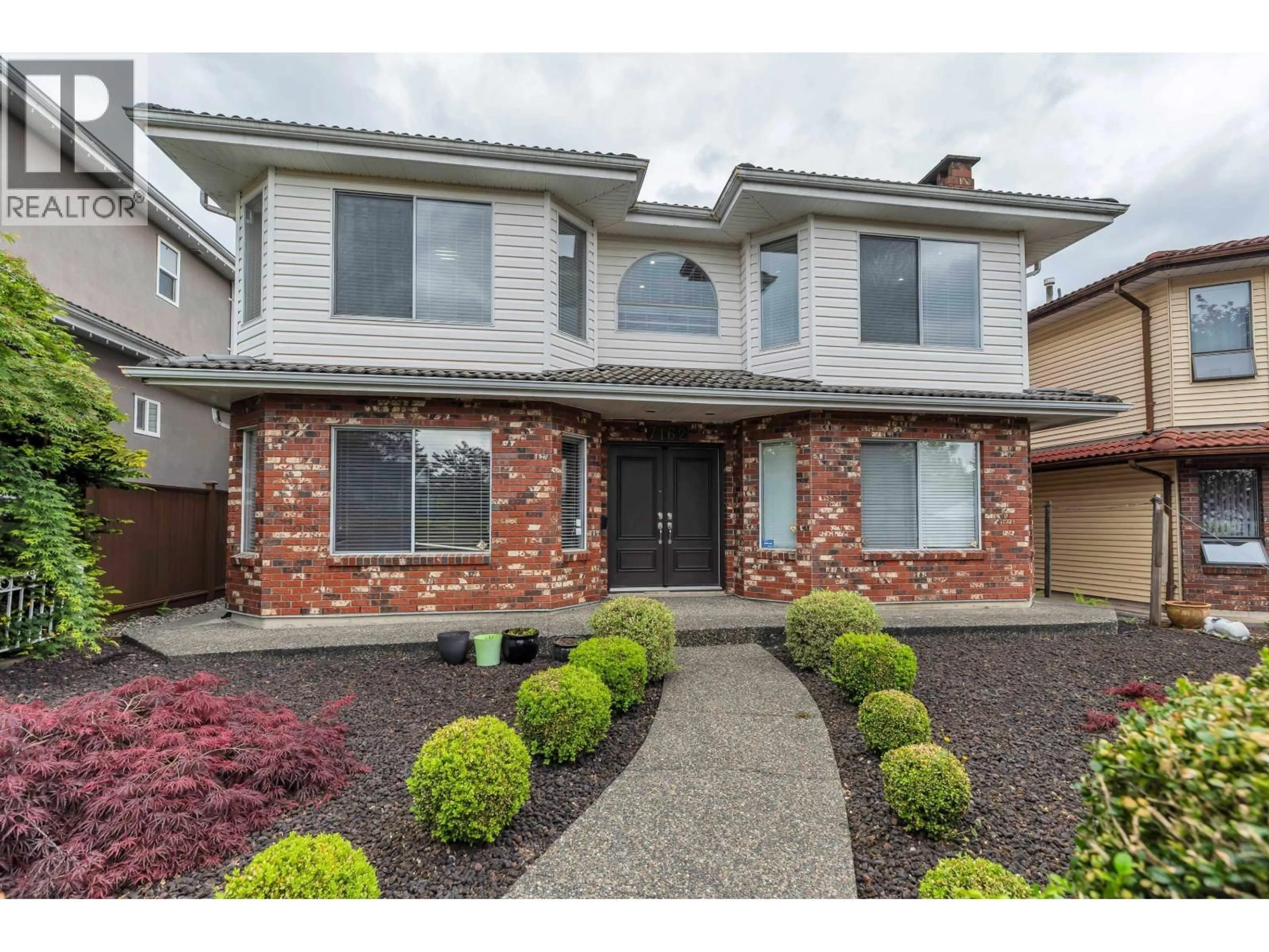 Home with brick exterior material, street for 7162 GLADSTONE STREET, Vancouver British Columbia V5P4G6