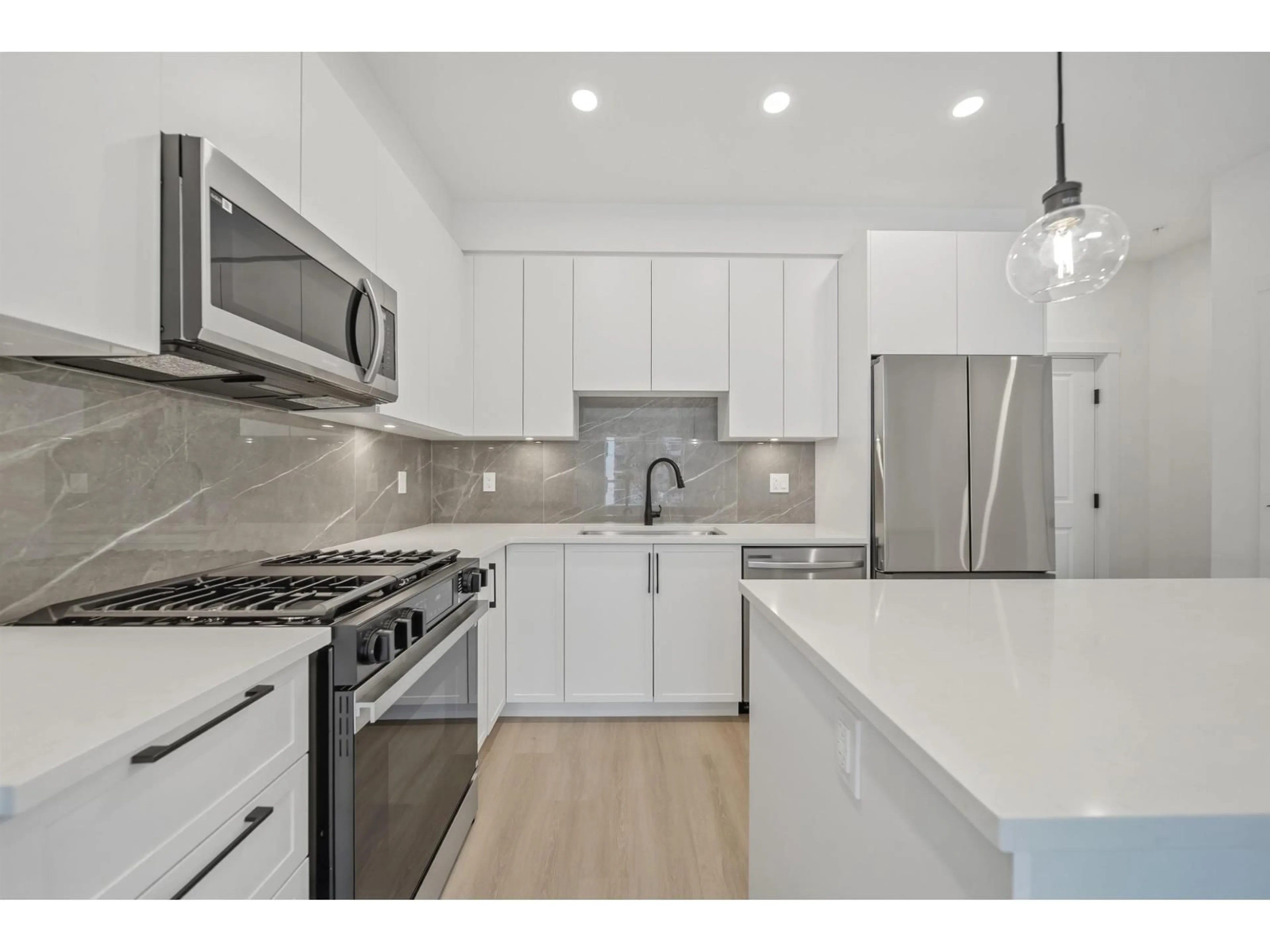 Open concept kitchen, unknown for 401 - 3438 146A STREET, Surrey British Columbia V0V0V0