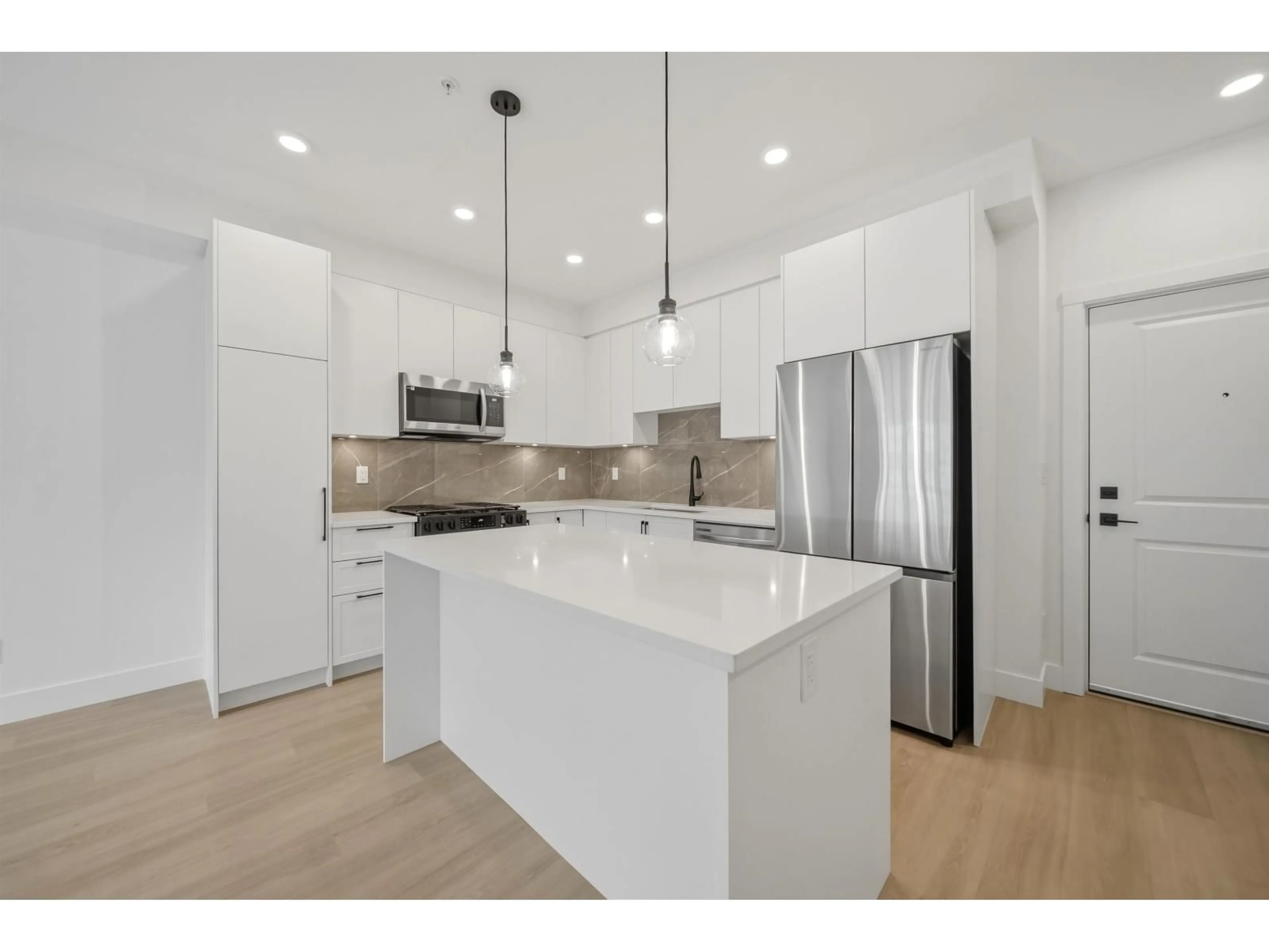 Open concept kitchen, unknown for 401 - 3438 146A STREET, Surrey British Columbia V0V0V0