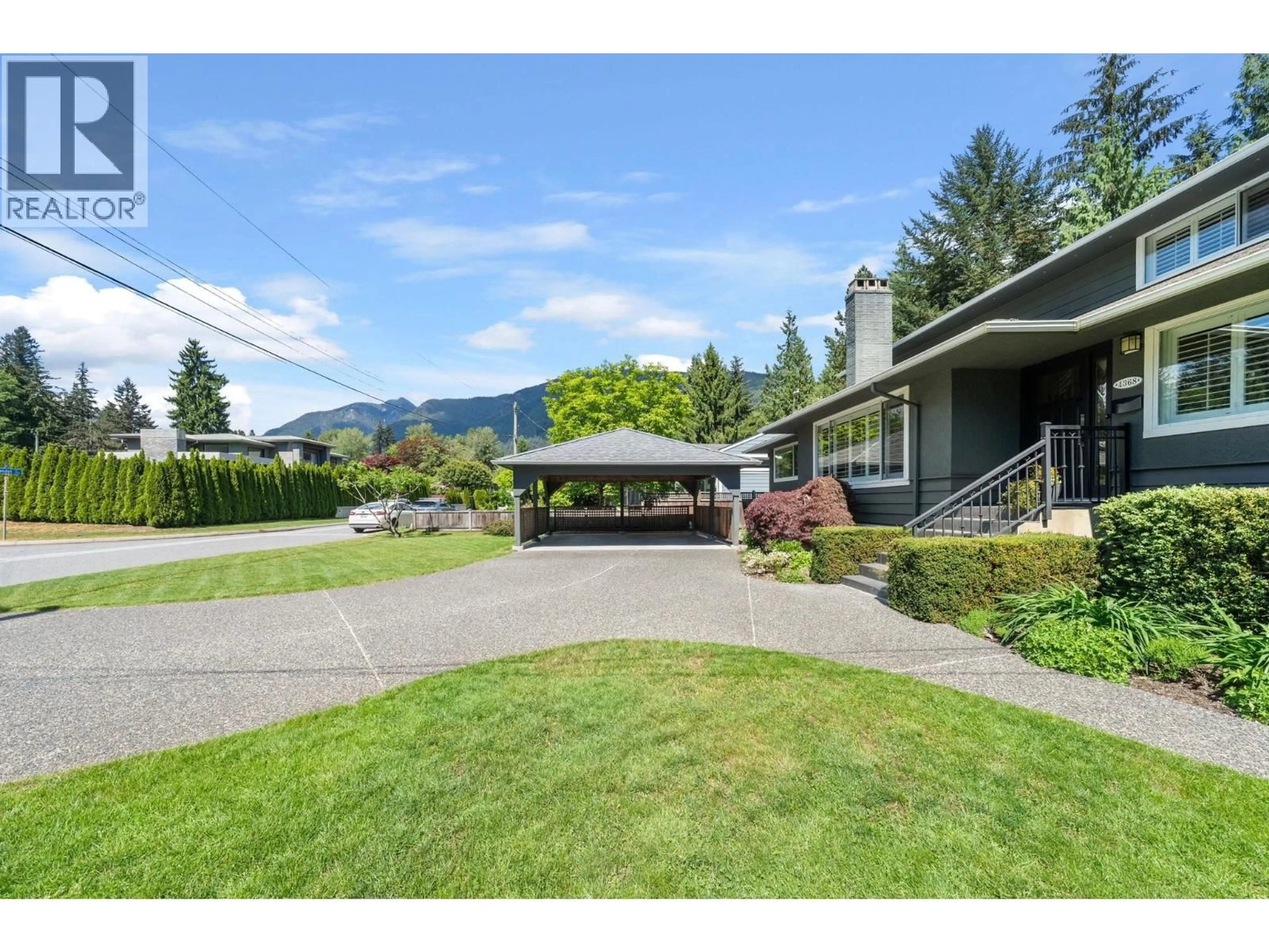 A pic from outside/outdoor area/front of a property/back of a property/a pic from drone, mountain view for 4368 ARUNDEL ROAD, North Vancouver British Columbia V7R3T2