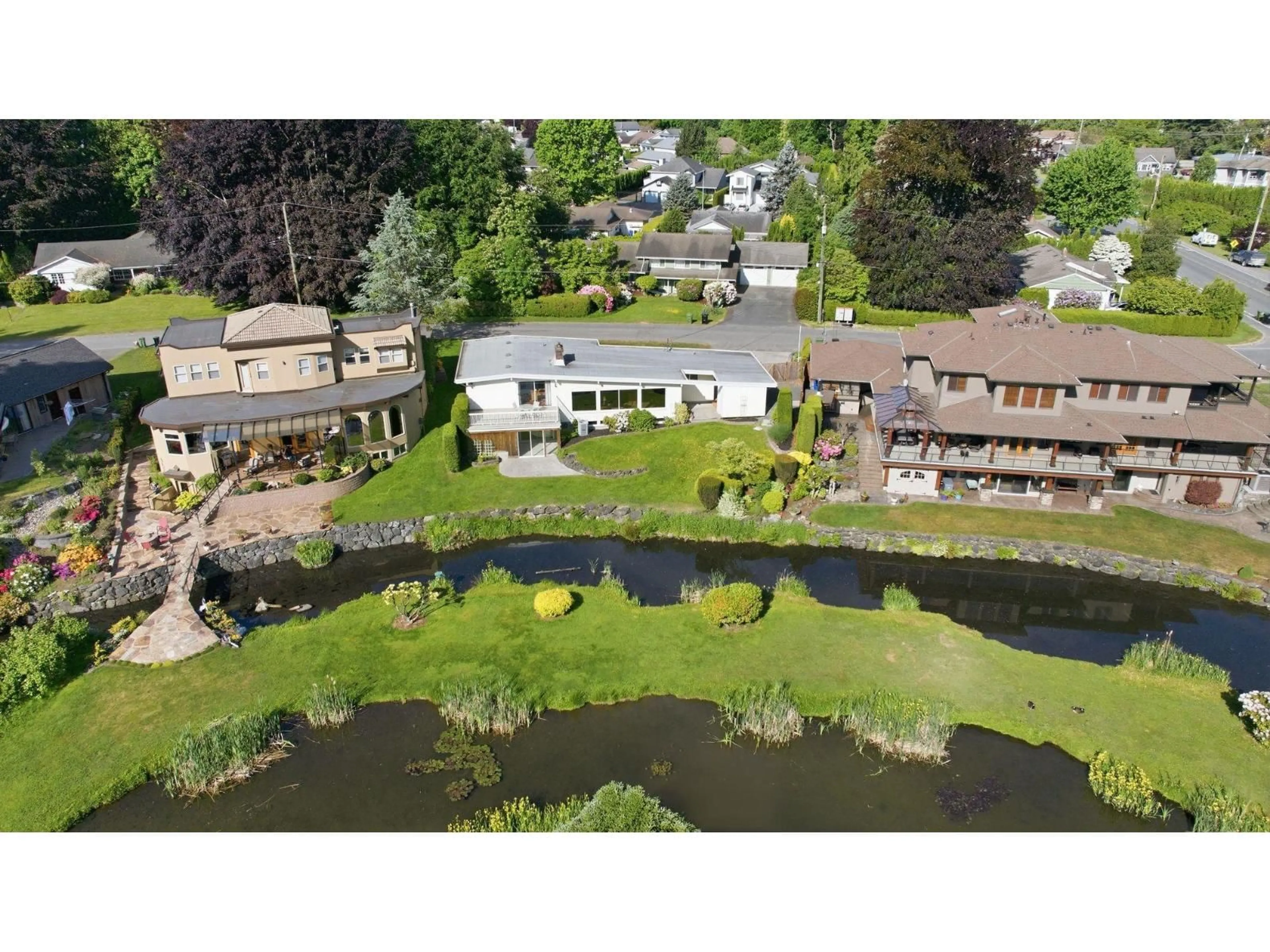 A pic from outside/outdoor area/front of a property/back of a property/a pic from drone, water/lake/river/ocean view for 7062 EDEN DRIVE, Chilliwack British Columbia V2R1E6