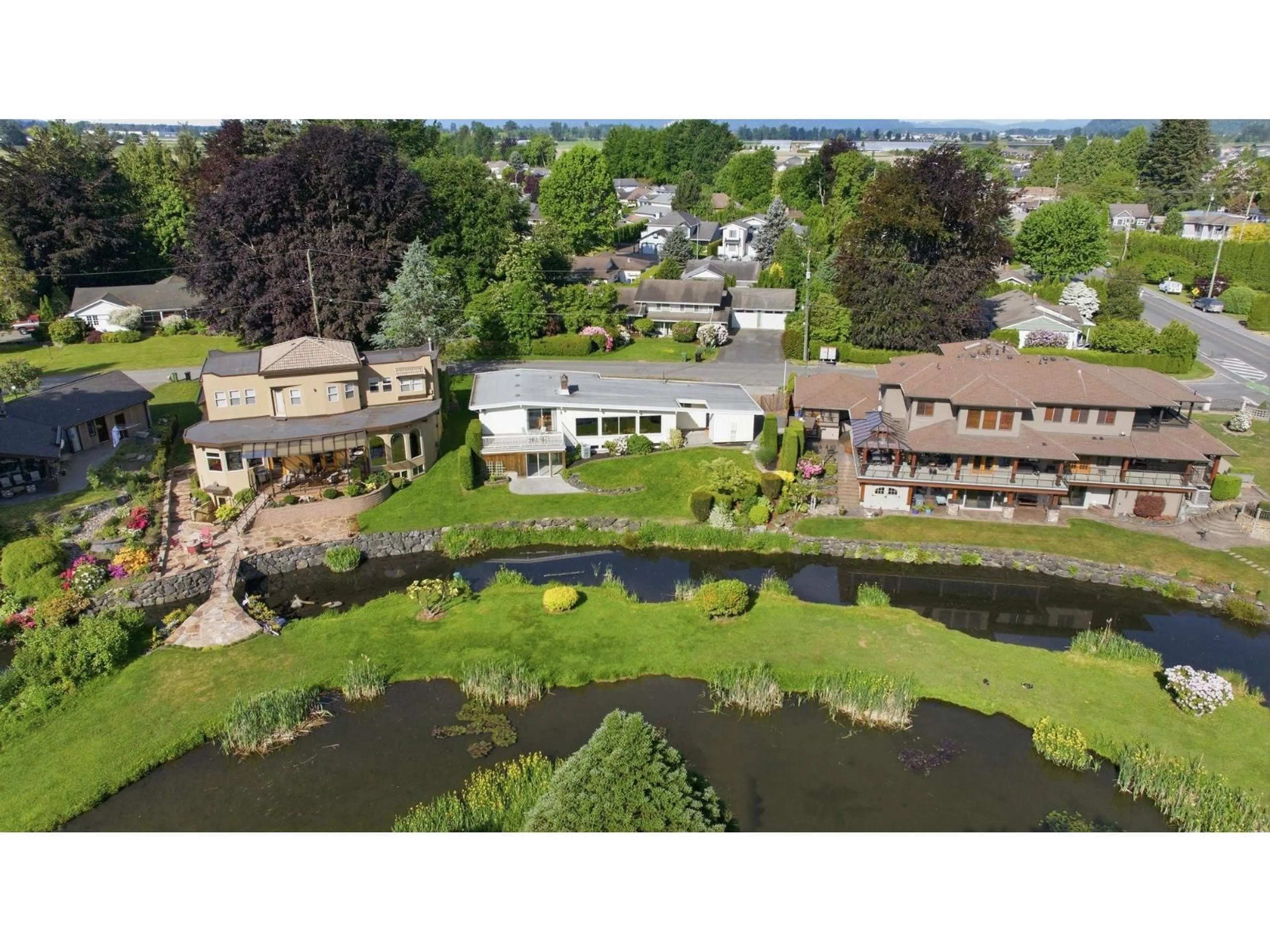 A pic from outside/outdoor area/front of a property/back of a property/a pic from drone, water/lake/river/ocean view for 7062 EDEN DRIVE, Chilliwack British Columbia V2R1E6