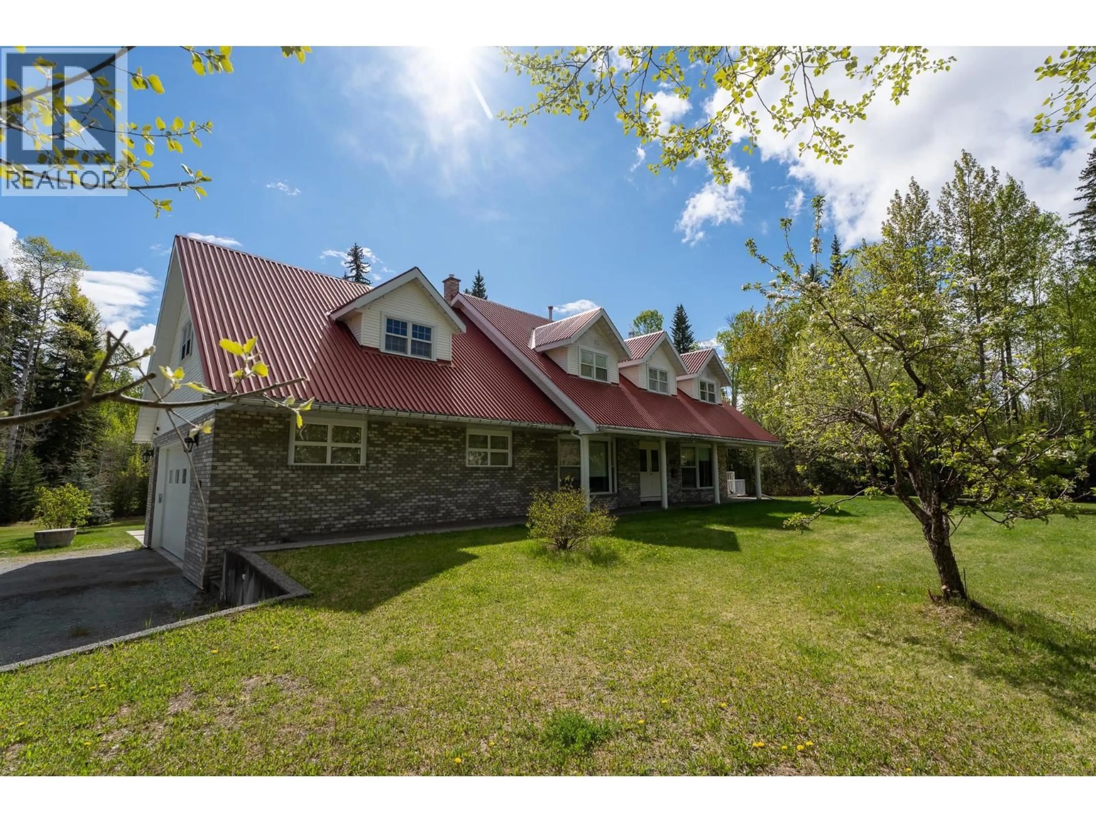 A pic from outside/outdoor area/front of a property/back of a property/a pic from drone, unknown for 8998 SYKES ROAD, Prince George British Columbia V2N6N4