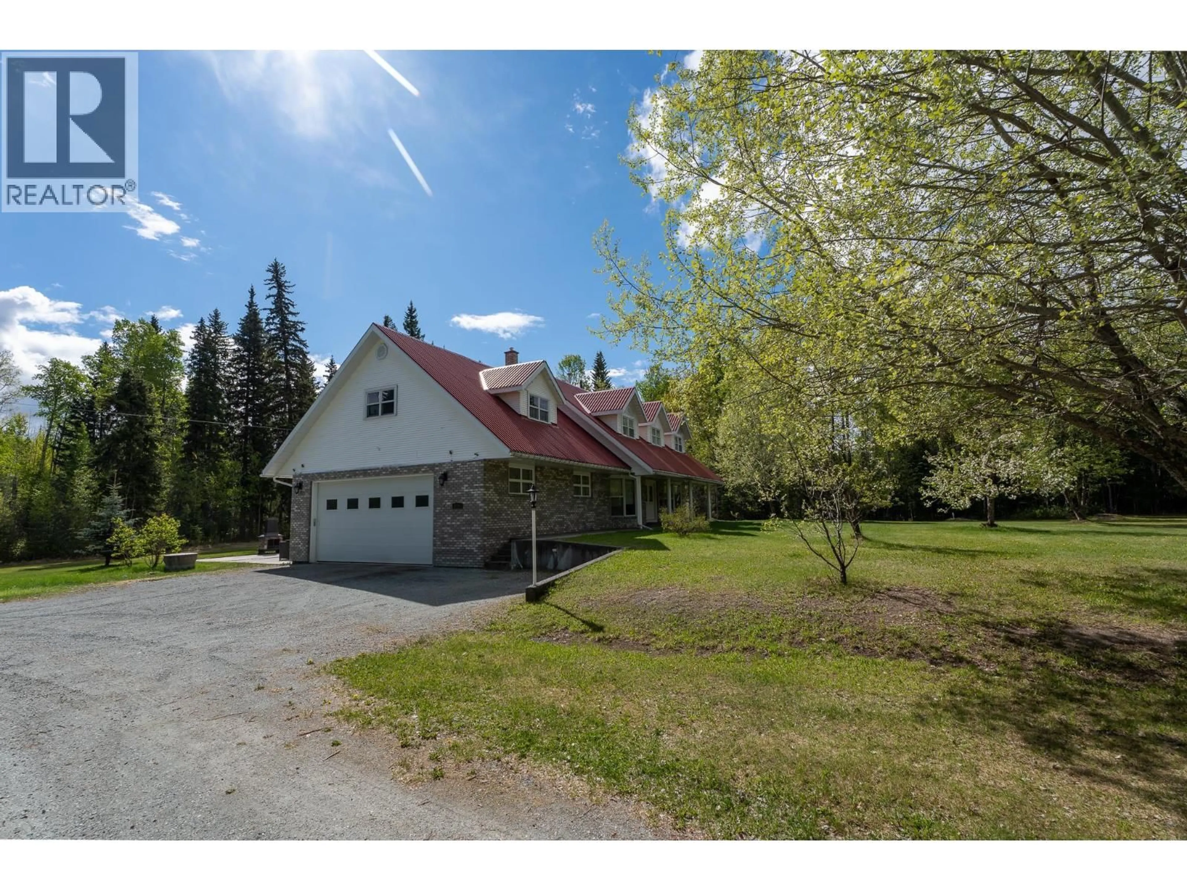 A pic from outside/outdoor area/front of a property/back of a property/a pic from drone, street for 8998 SYKES ROAD, Prince George British Columbia V2N6N4