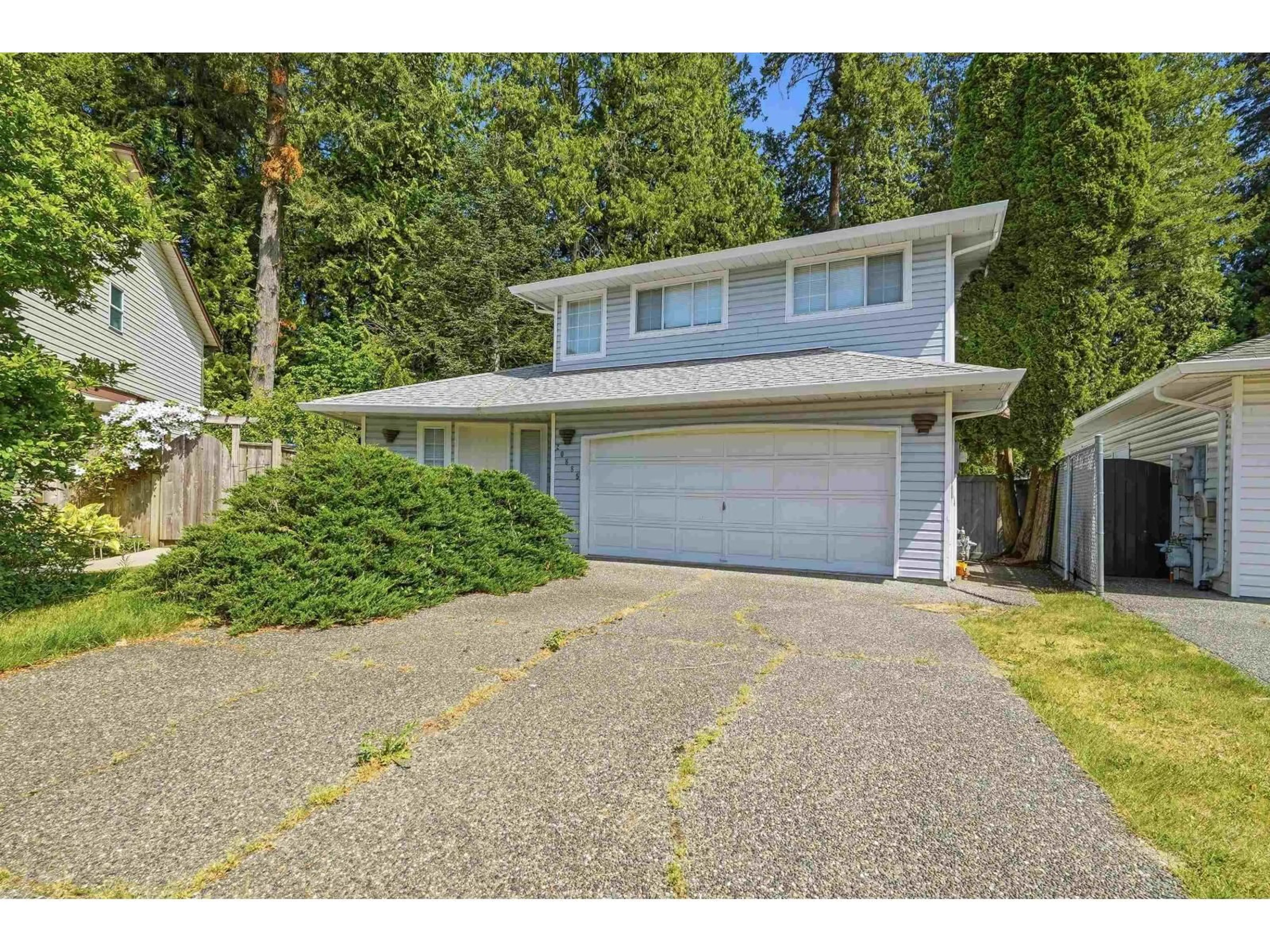 Home with vinyl exterior material, street for 20885 95A AVENUE, Langley British Columbia V1M2C5