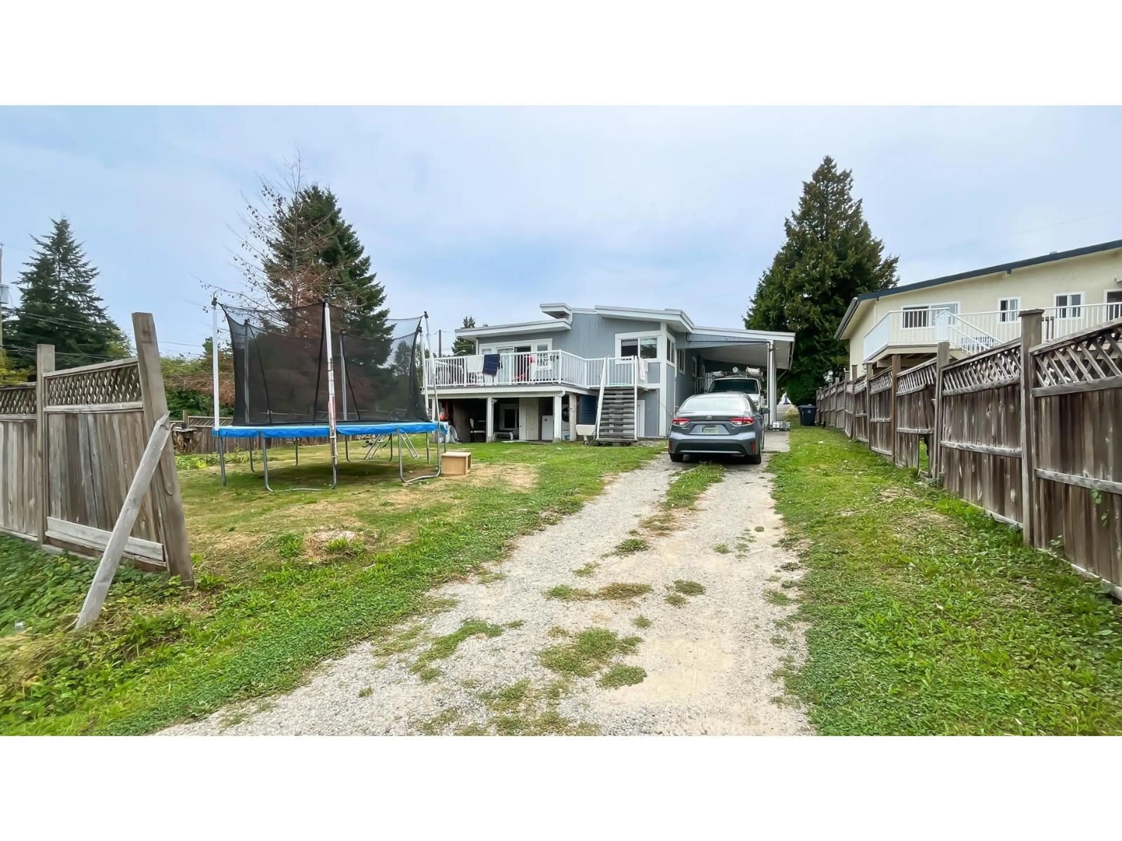 A pic from outside/outdoor area/front of a property/back of a property/a pic from drone, street for 14171 77A AVENUE, Surrey British Columbia V3W2X2