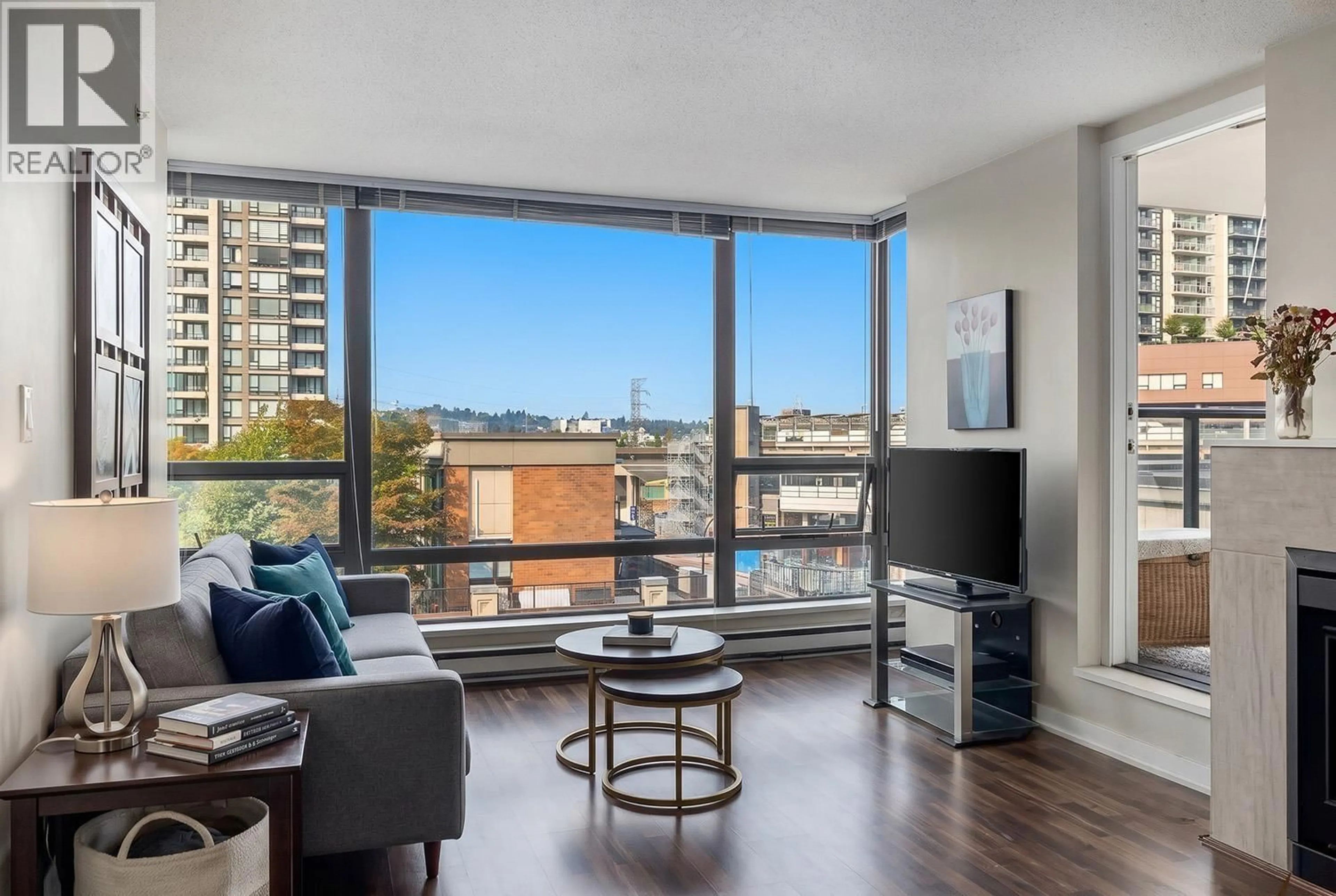 Living room with furniture, wood/laminate floor for 506 - 4182 DAWSON STREET, Burnaby British Columbia V5C0A2