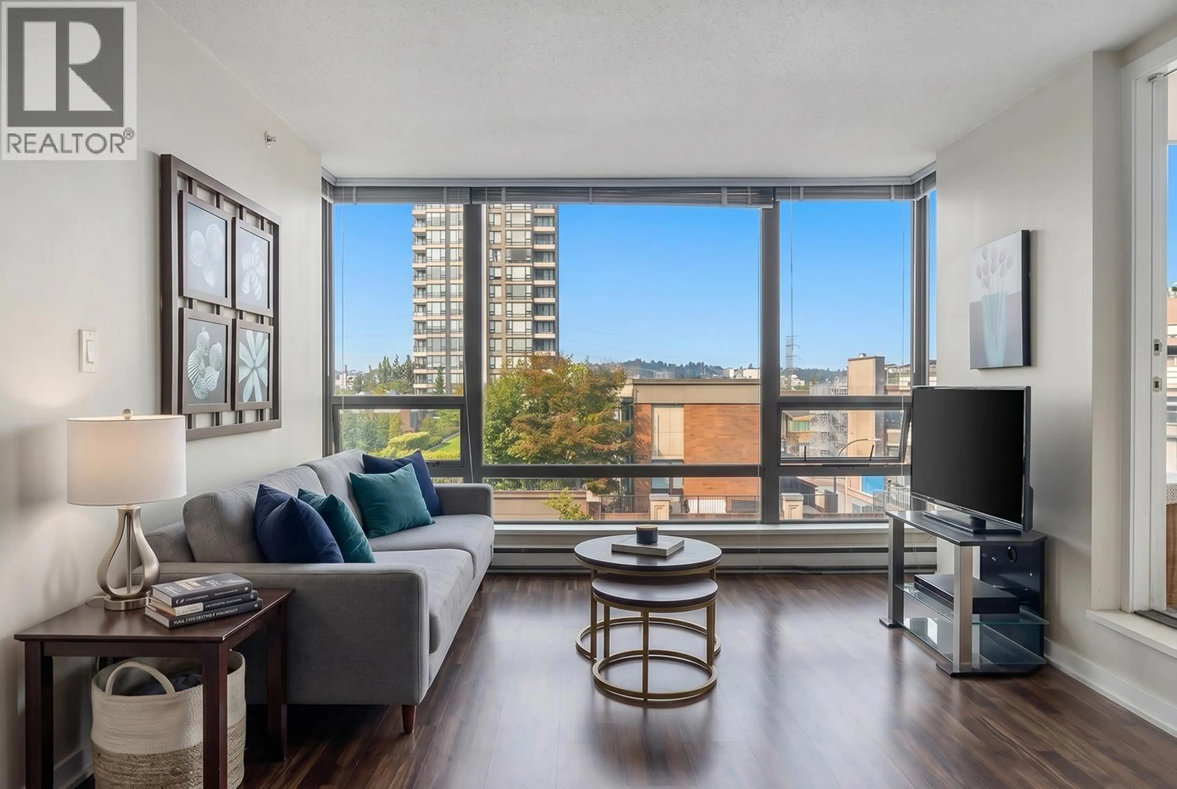 Living room with furniture, wood/laminate floor for 506 - 4182 DAWSON STREET, Burnaby British Columbia V5C0A2