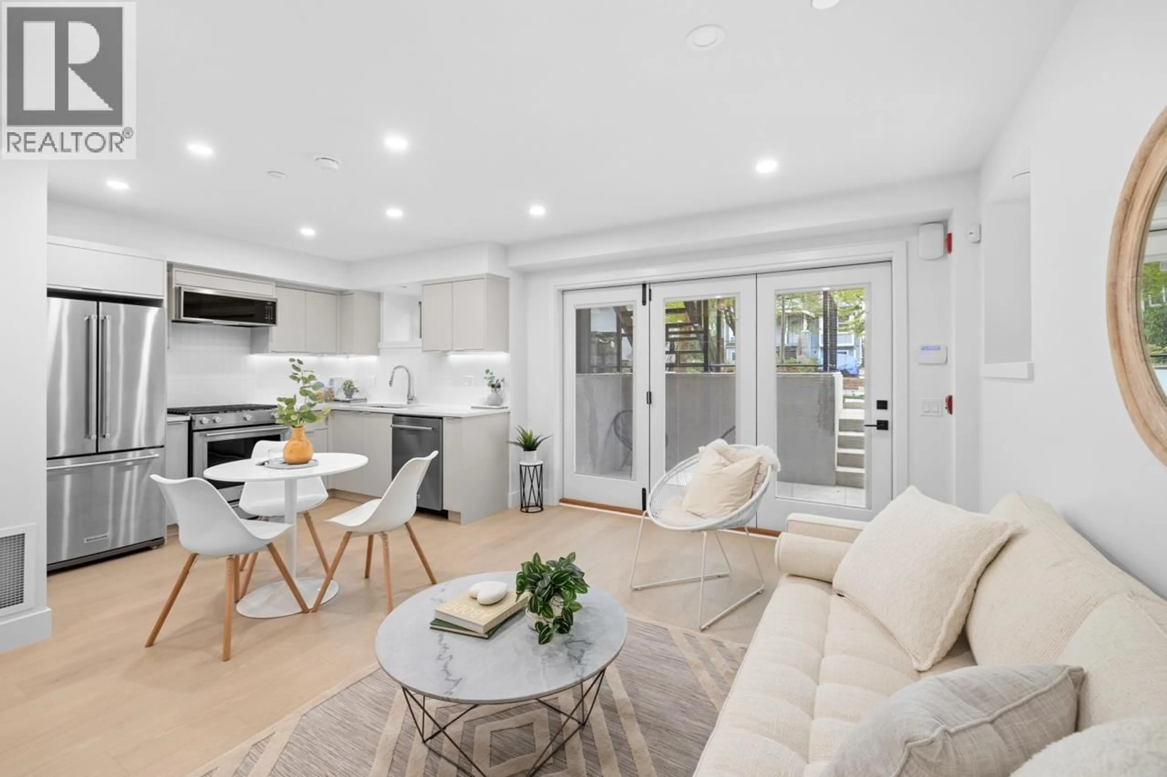 Open concept kitchen, unknown for 101 - 2135 PENDER STREET, Vancouver British Columbia V5L1X3