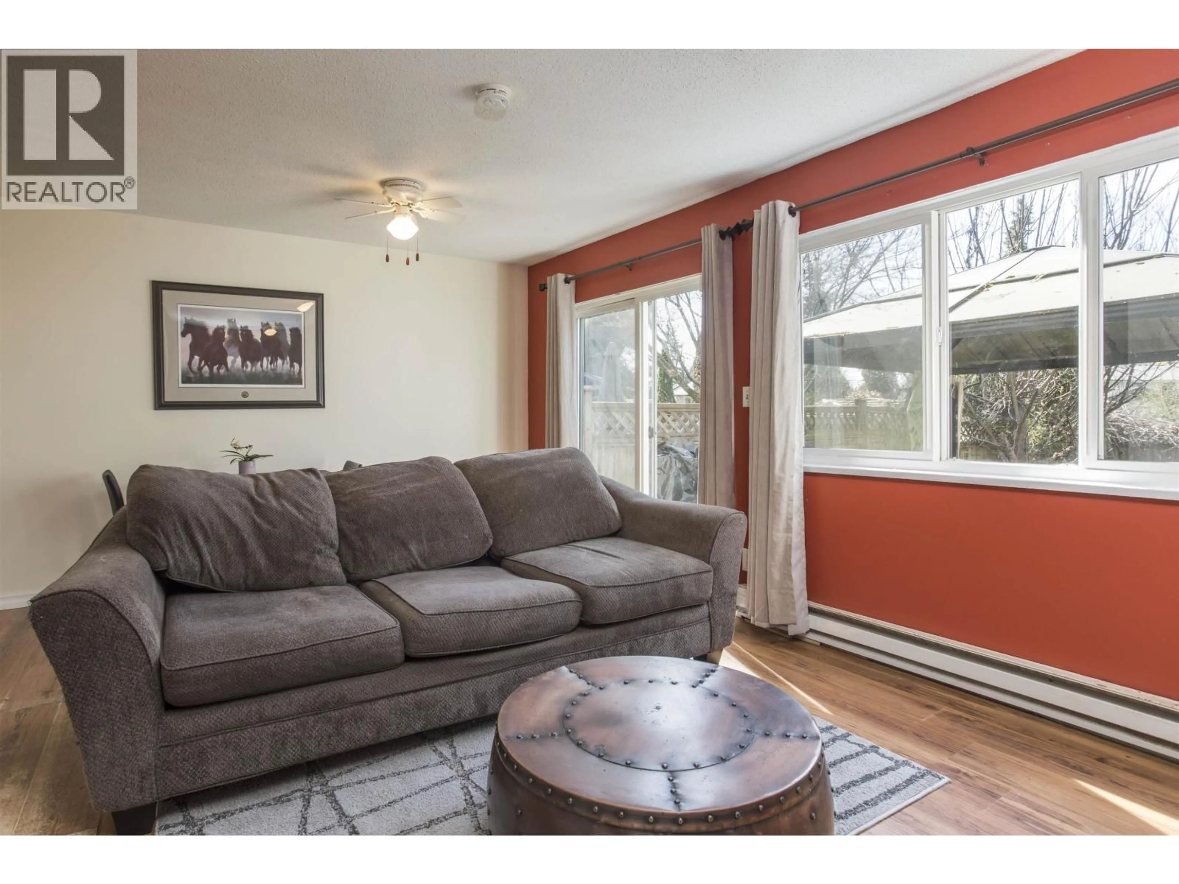 Living room with furniture, wood/laminate floor for 1 - 12101 SCHMIDT CRESCENT, Maple Ridge British Columbia V2X8A2