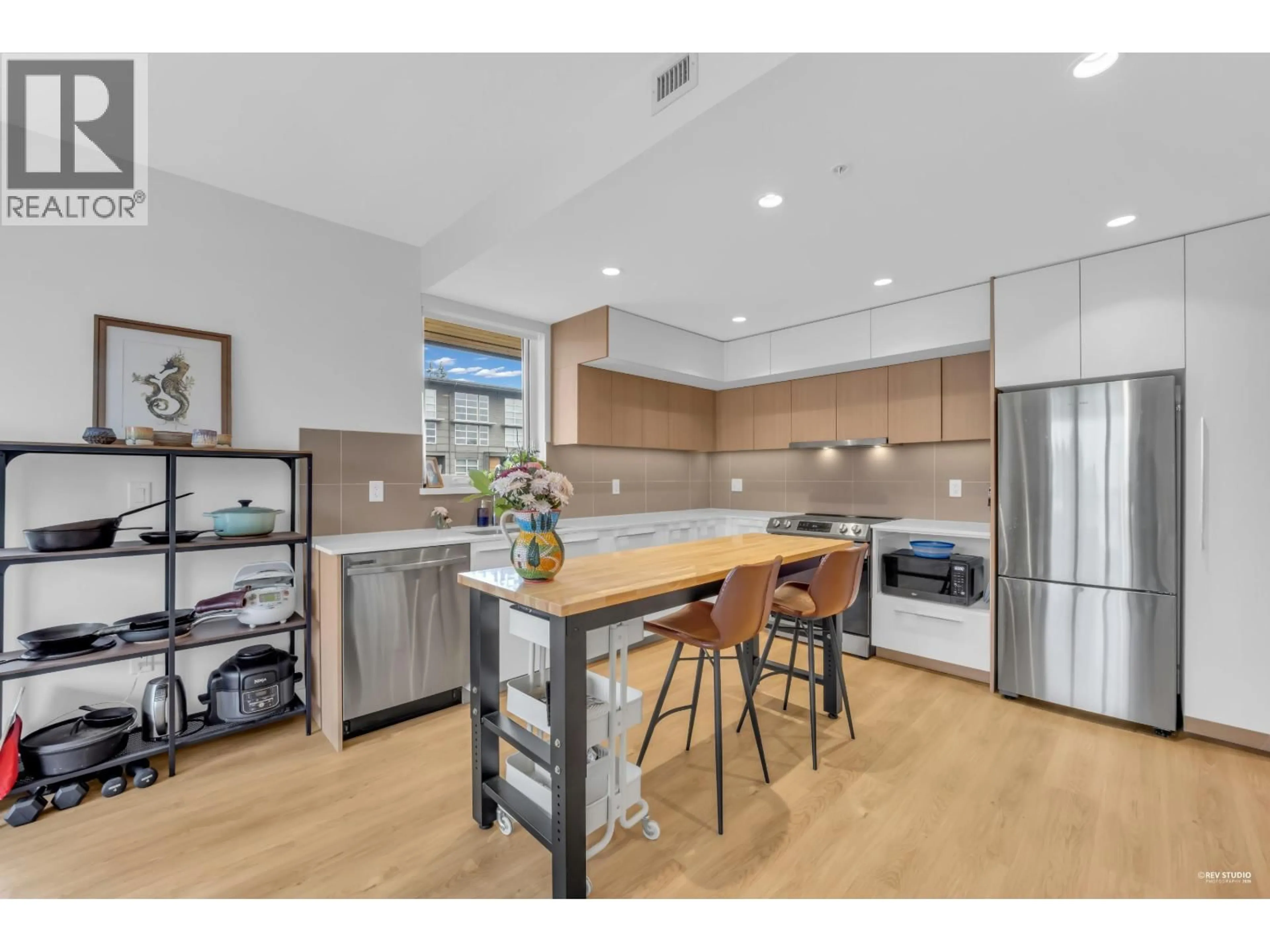 Open concept kitchen, wood/laminate floor for 510 - 9888 UNIVERSITY CRESCENT, Burnaby British Columbia V5A0G4
