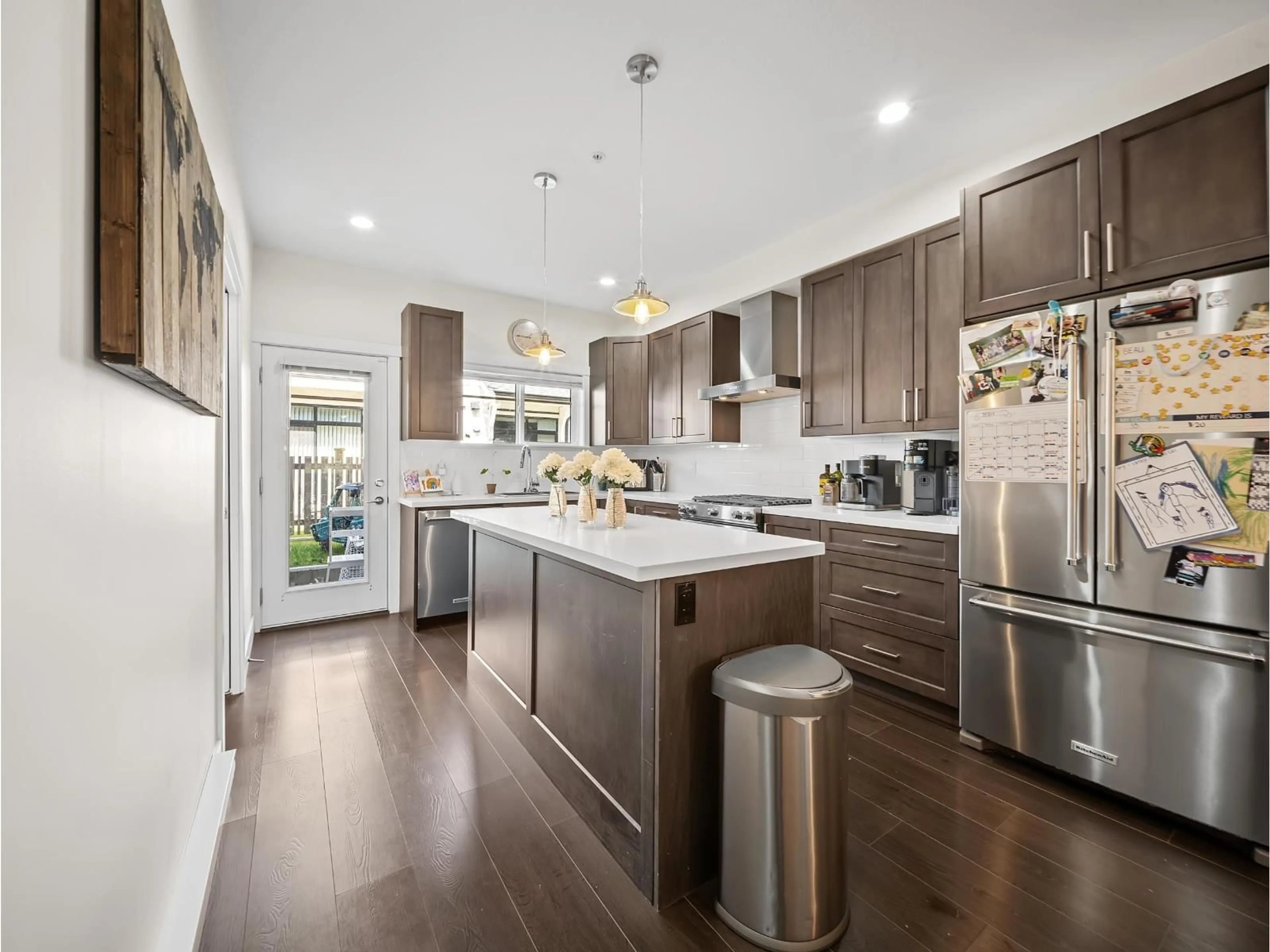 Contemporary kitchen, wood/laminate floor for 115 - 16528 24A AVENUE, Surrey British Columbia V3Z0P4