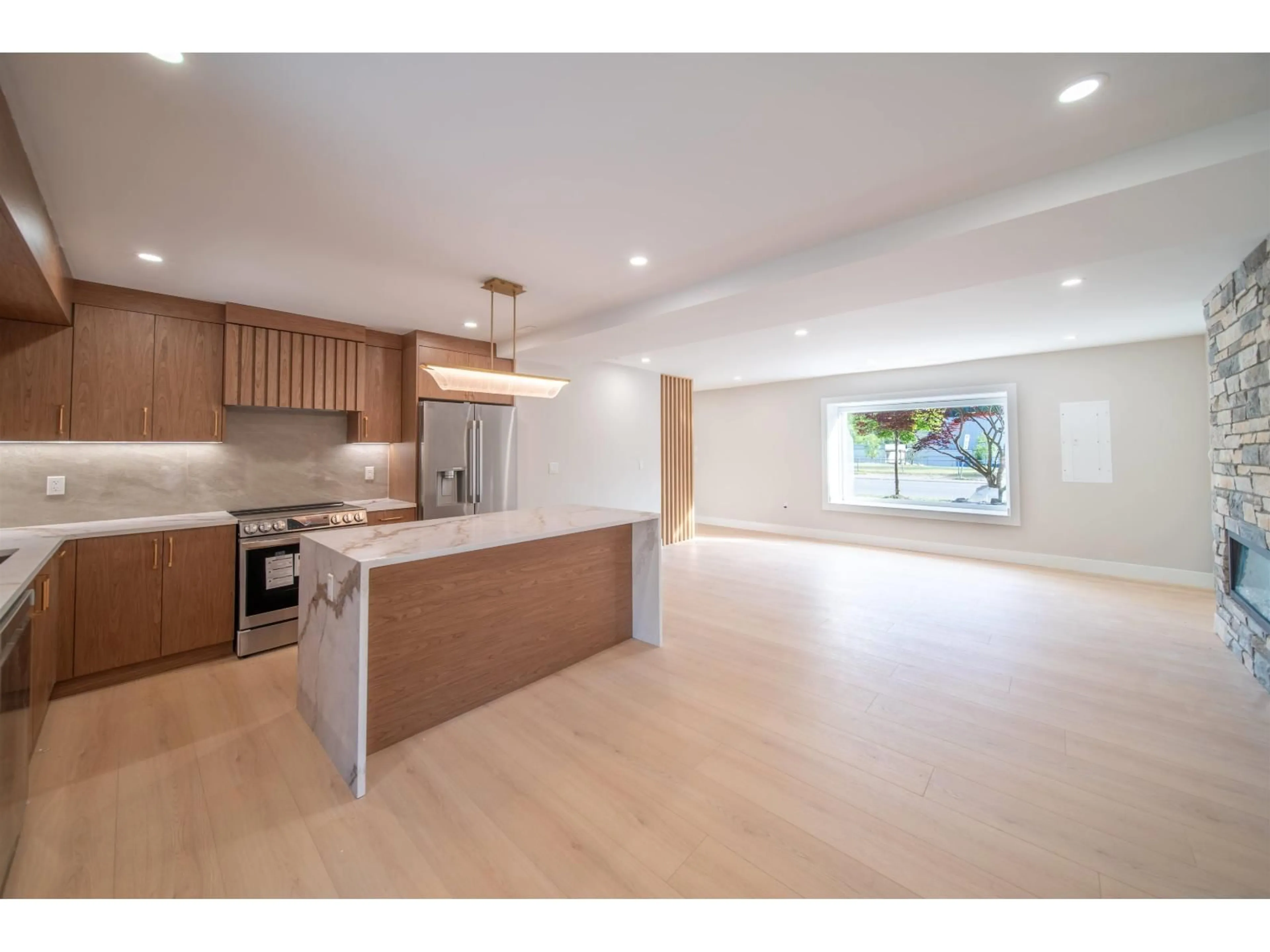 Open concept kitchen, wood/laminate floor for 11659 LYON ROAD, Delta British Columbia V4E2S8