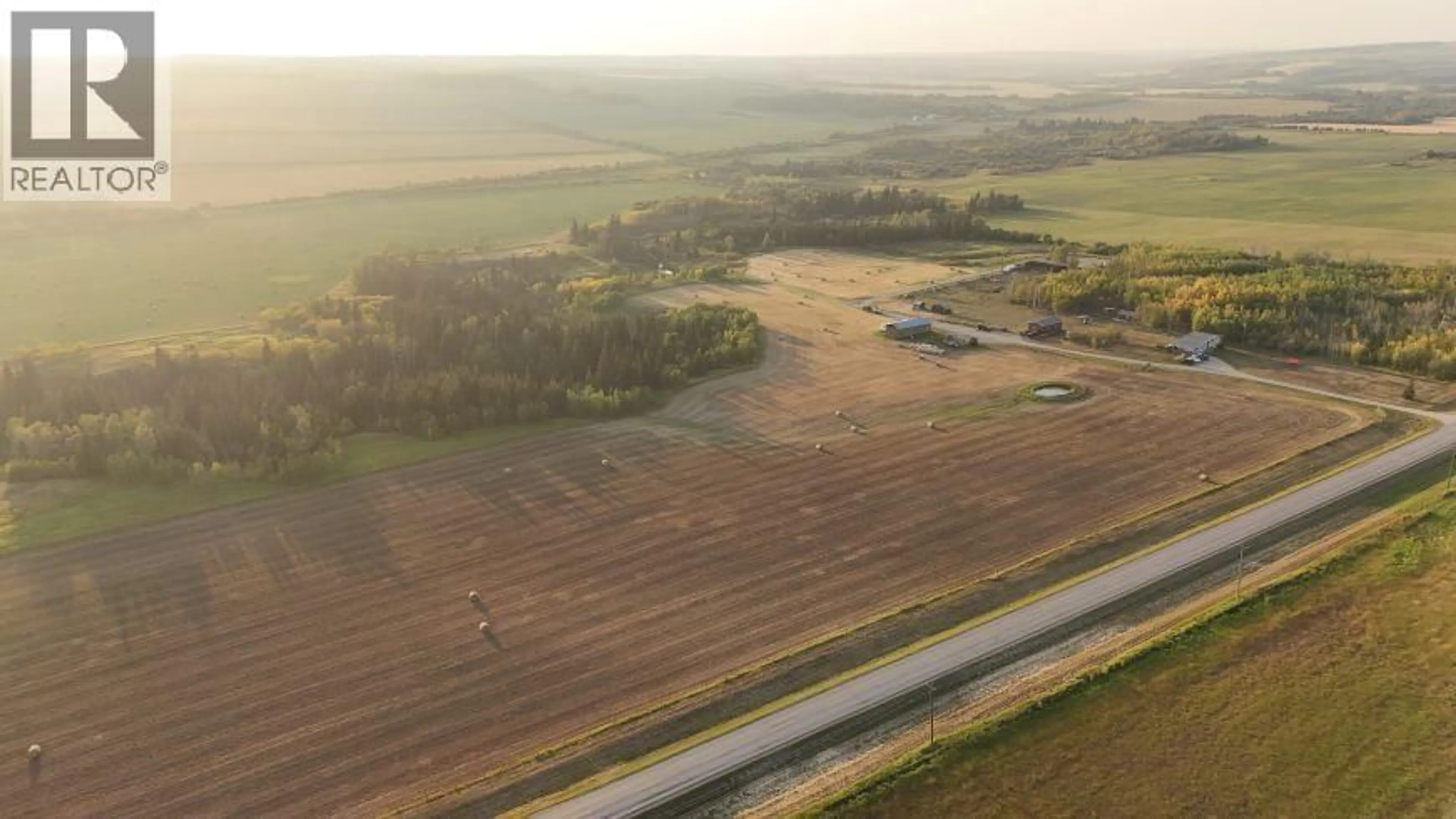 A pic from outside/outdoor area/front of a property/back of a property/a pic from drone, unknown for 15256 271 ROAD, Fort St. John British Columbia V1J4M6