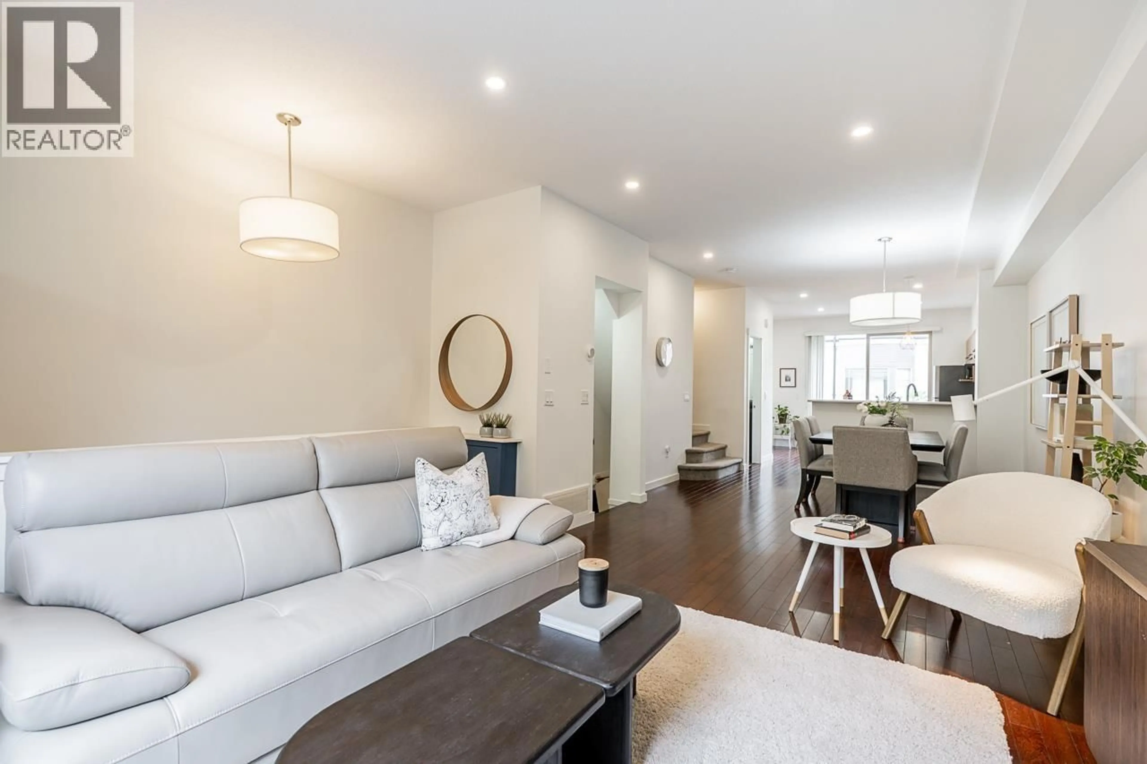 Living room with furniture, wood/laminate floor for 8 - 100 KLAHANIE DRIVE, Port Moody British Columbia V3H5K3