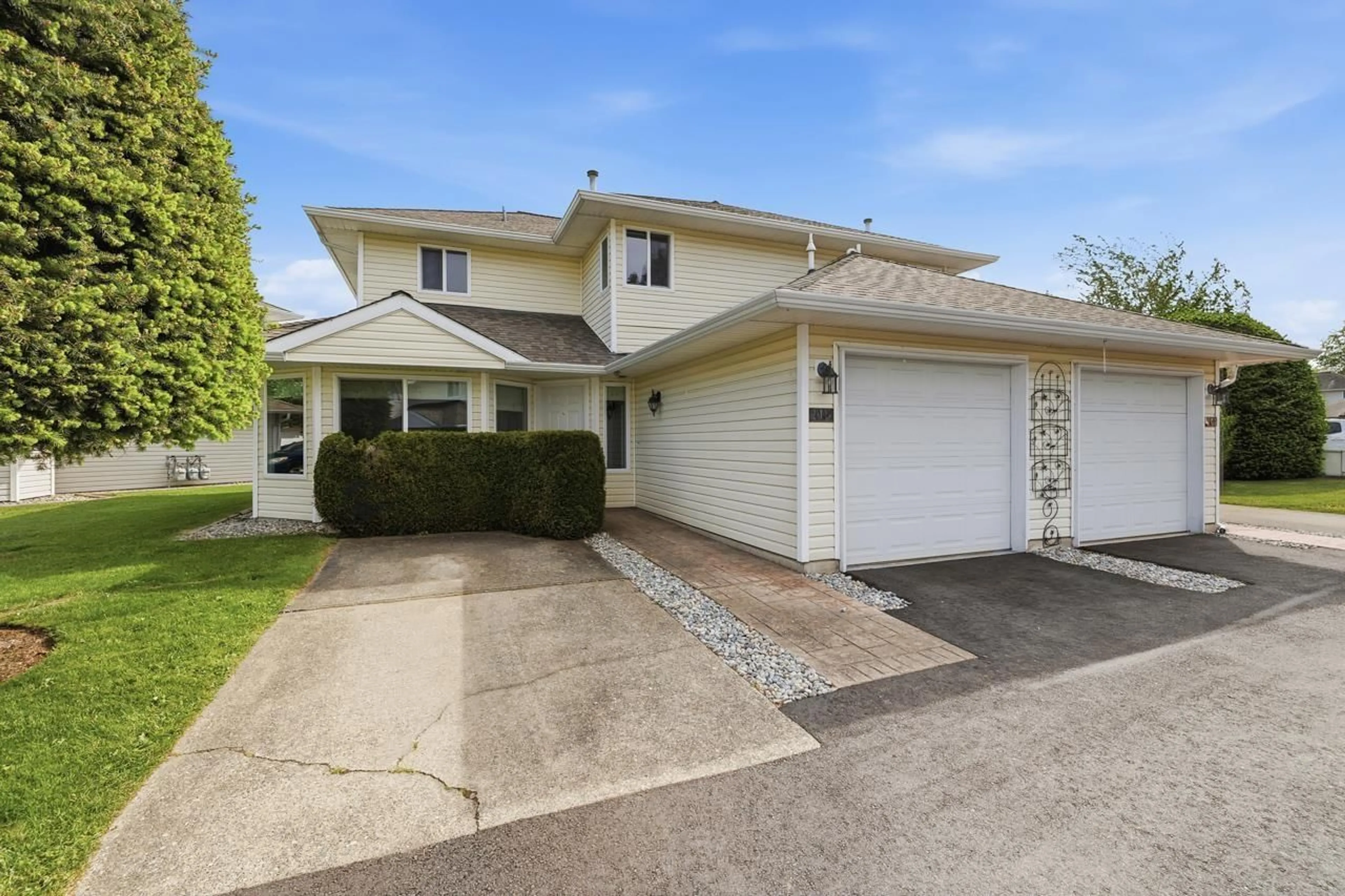 Home with vinyl exterior material, street for 115 - 21928 48 AVENUE, Langley British Columbia V3A8H1