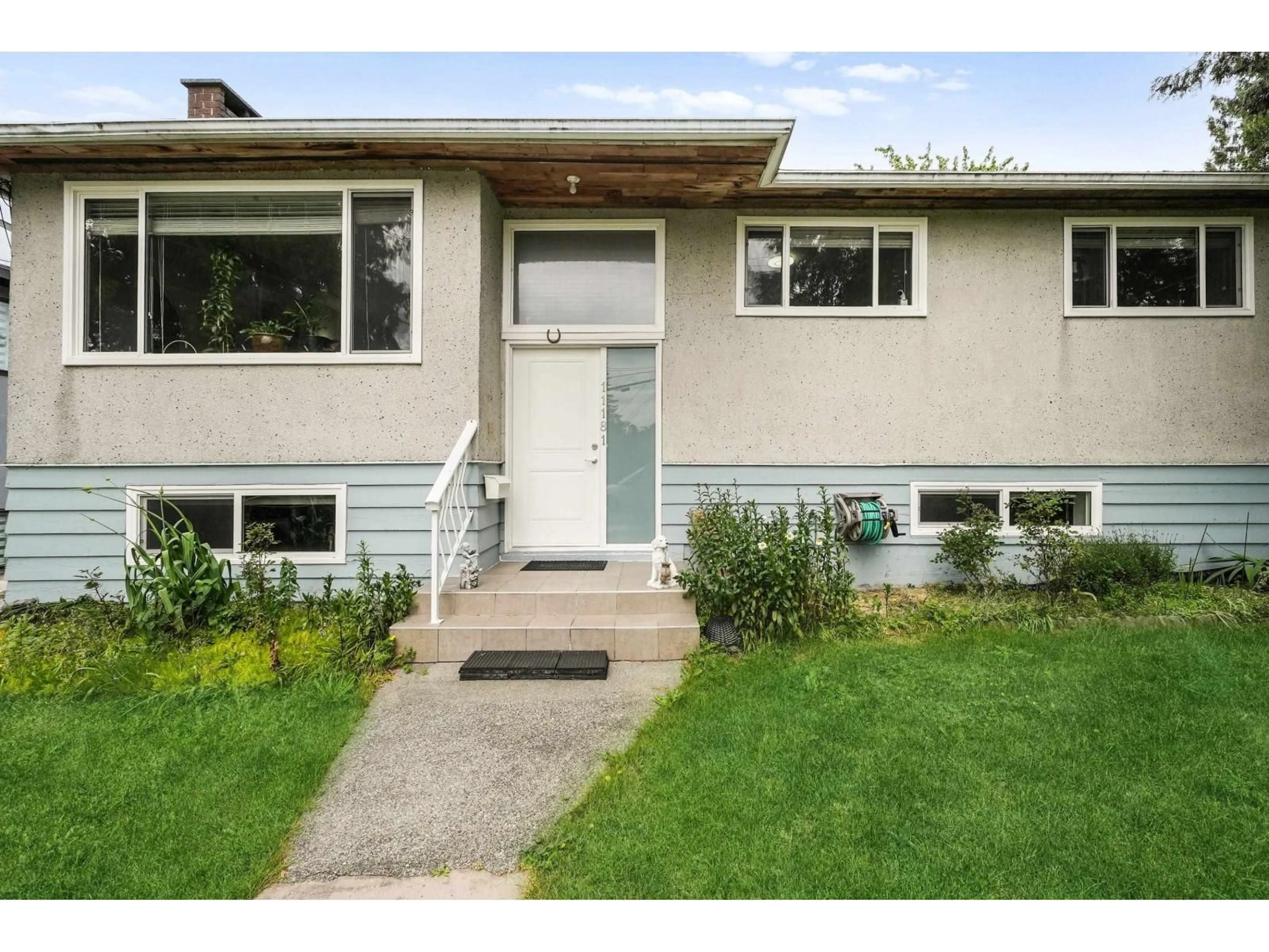 Home with vinyl exterior material, street for 11181 90 AVENUE, Delta British Columbia V4C3H1