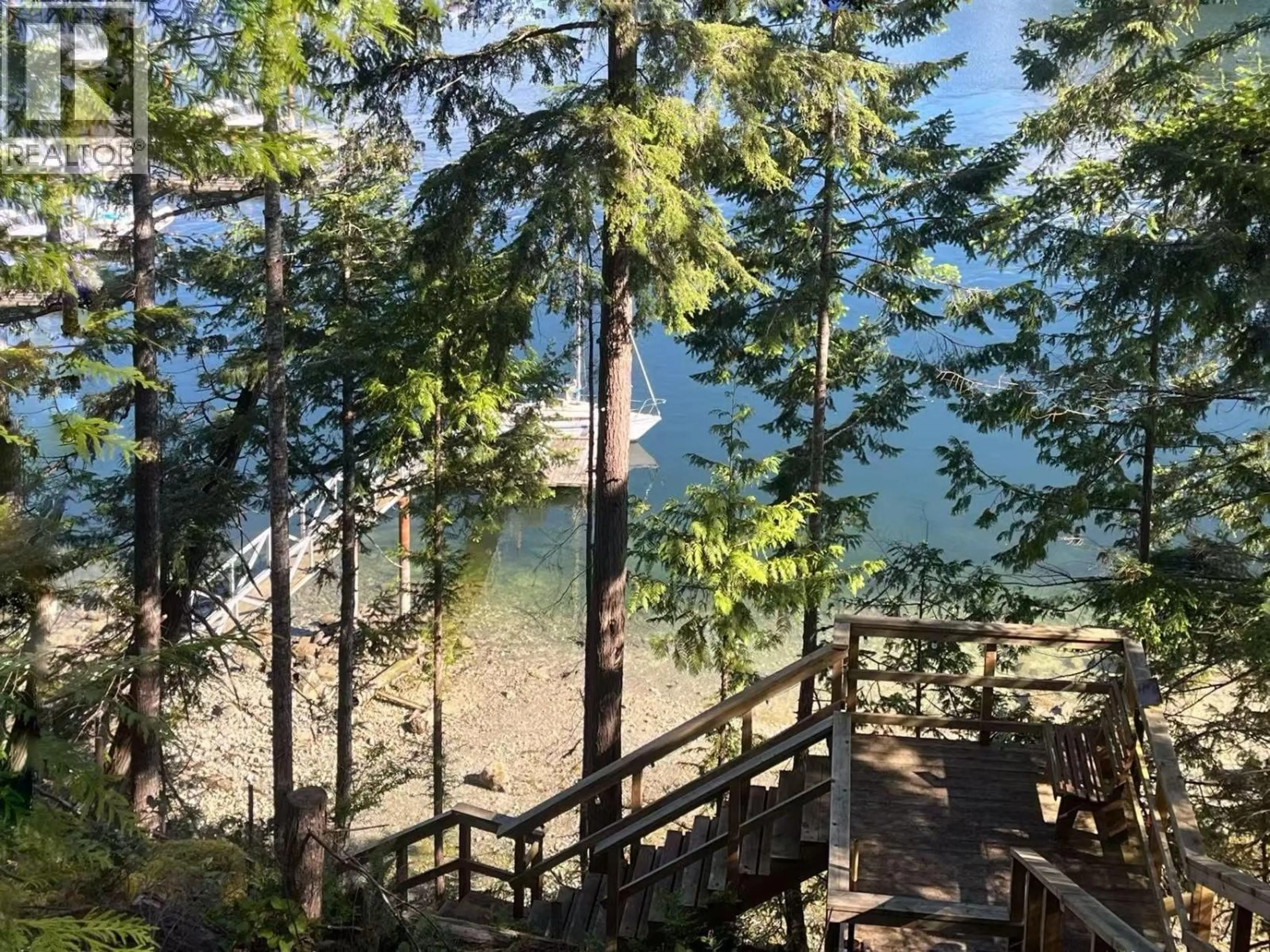 A pic from outside/outdoor area/front of a property/back of a property/a pic from drone, water/lake/river/ocean view for 5099 JOHNSTONE ROAD, Madeira Park British Columbia V0N2H1