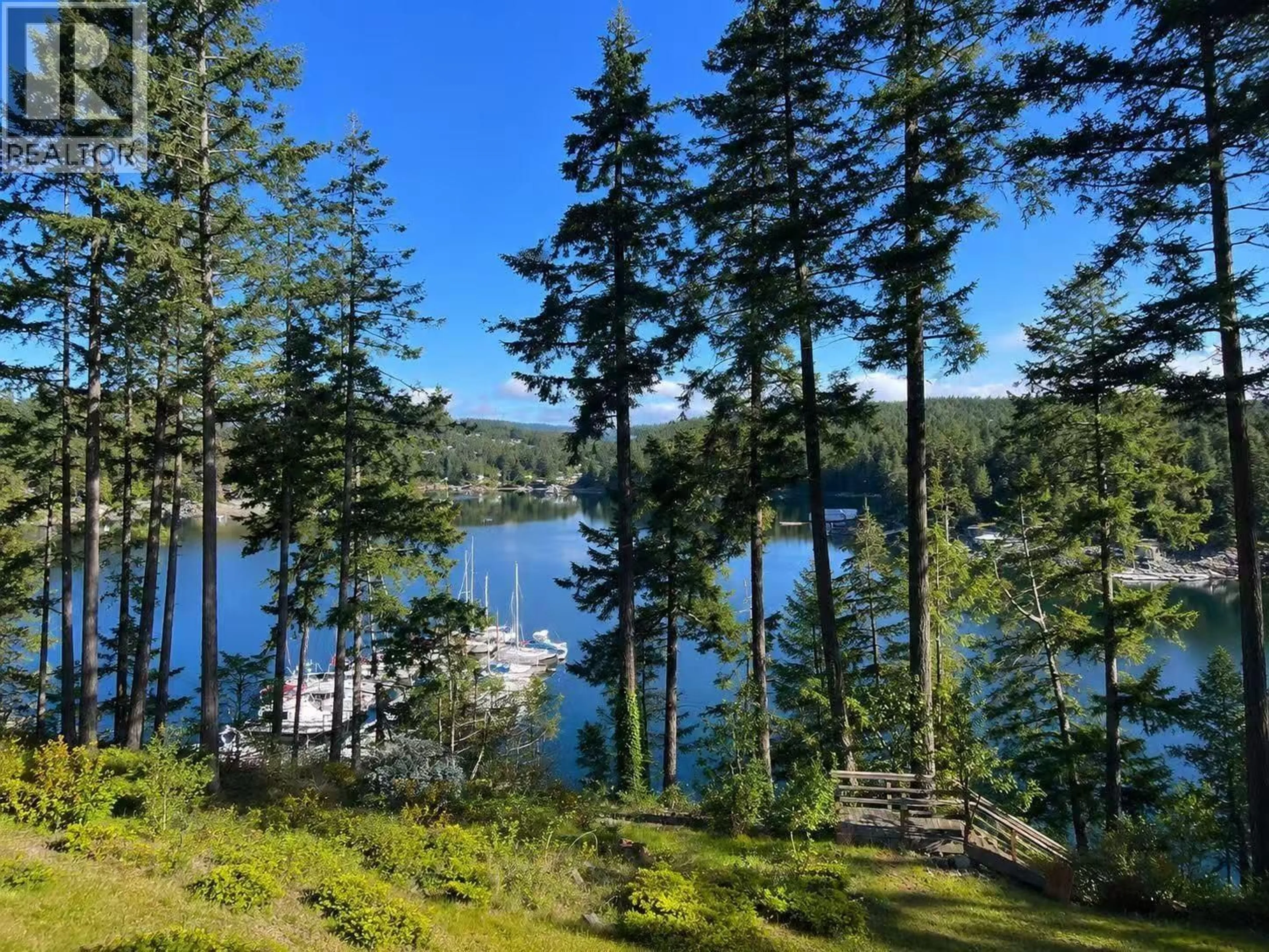 A pic from outside/outdoor area/front of a property/back of a property/a pic from drone, water/lake/river/ocean view for 5099 JOHNSTONE ROAD, Madeira Park British Columbia V0N2H1