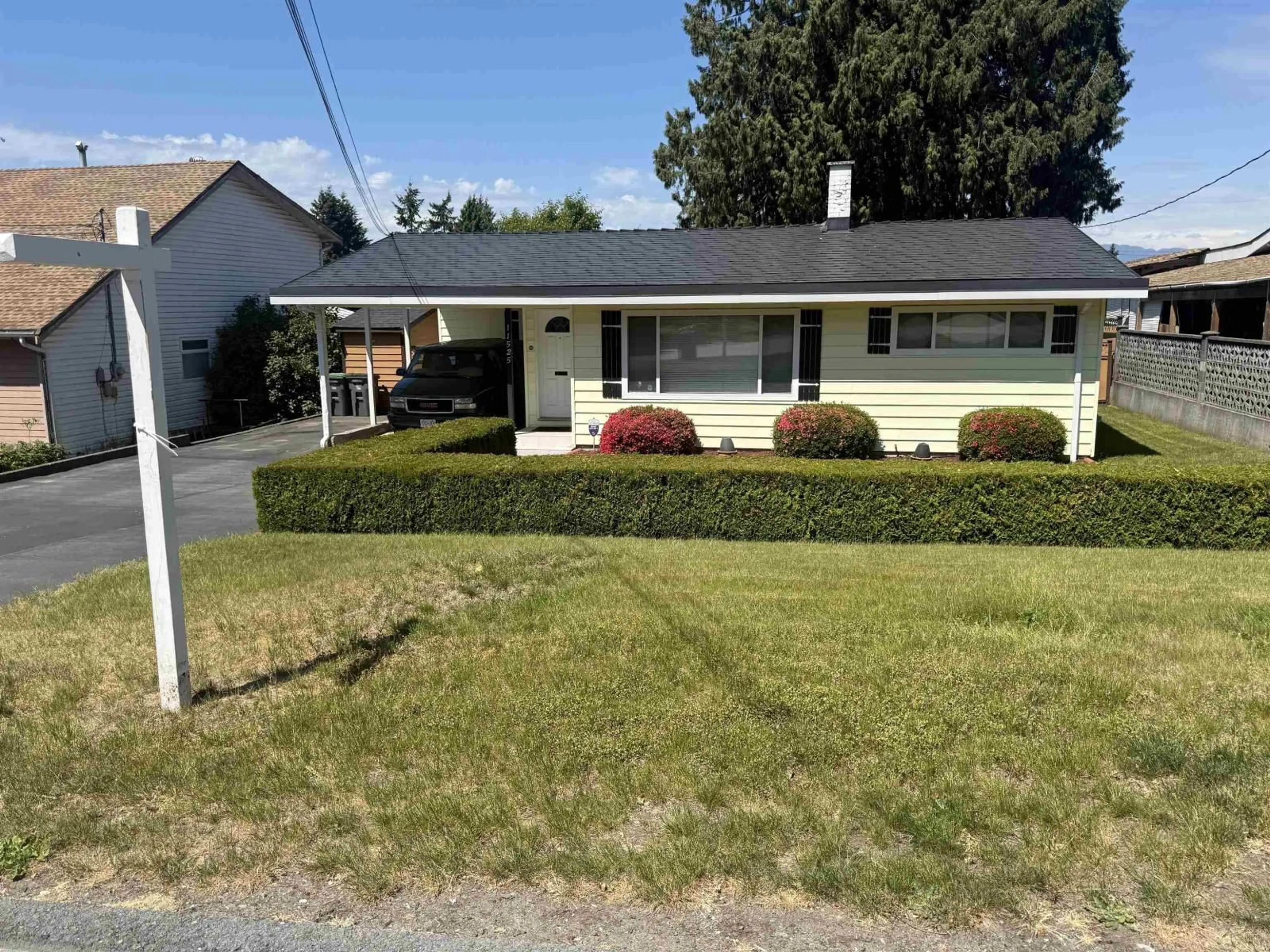 Home with vinyl exterior material, street for 11525 96A AVENUE, Surrey British Columbia V3V1Z9