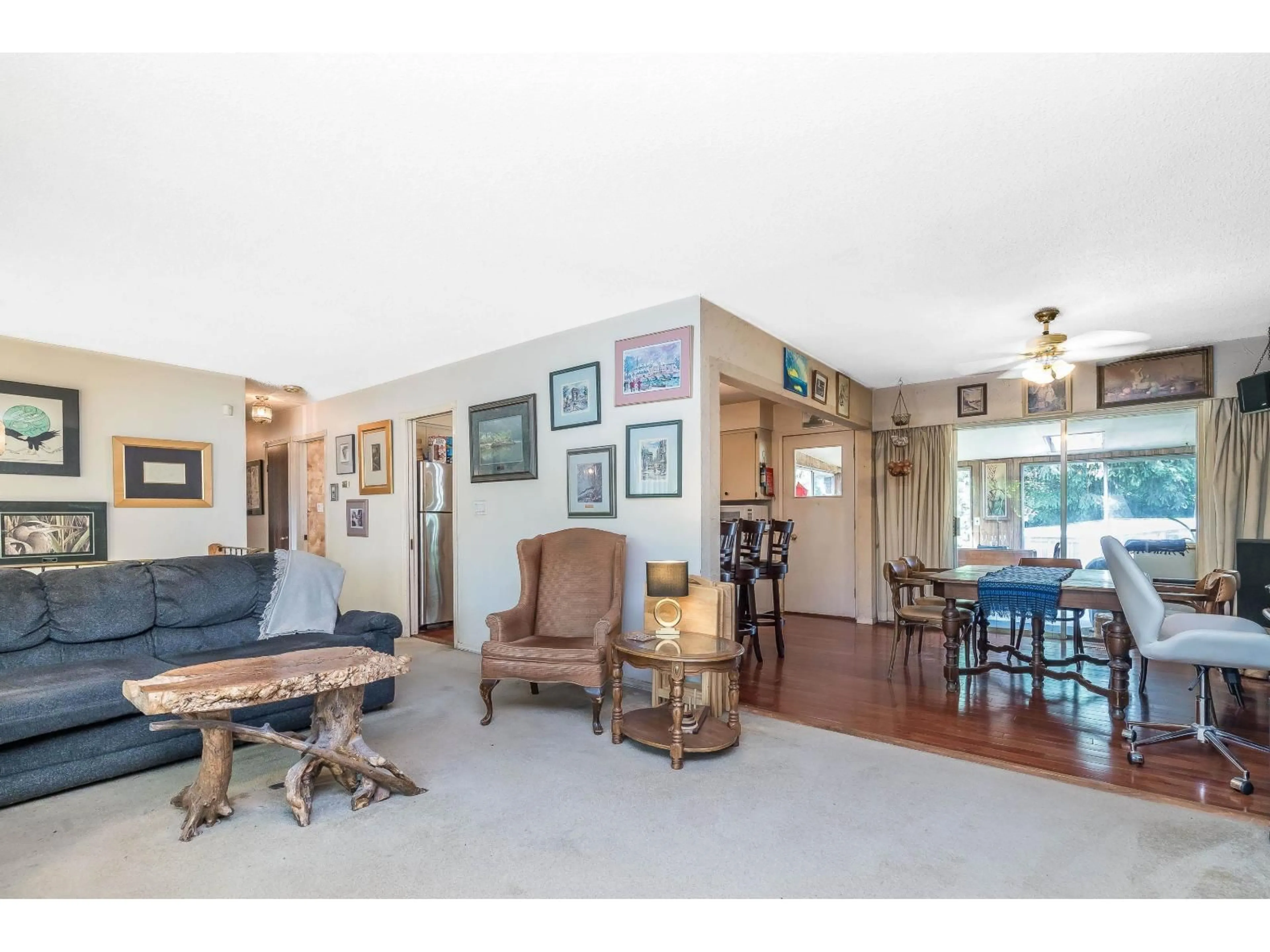 Living room with furniture, wood/laminate floor for 2141 WARE STREET, Abbotsford British Columbia V2S3C4