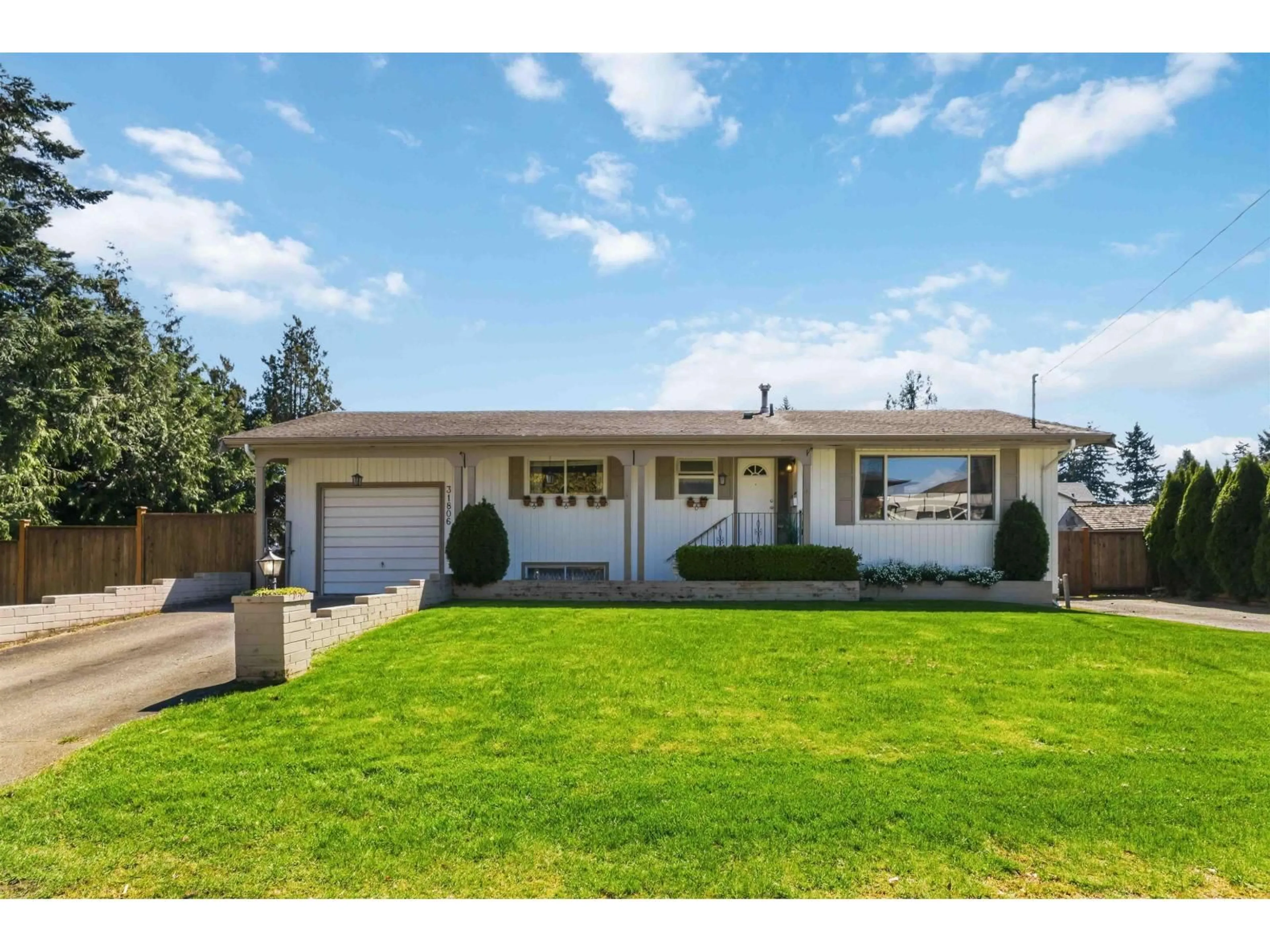 Home with vinyl exterior material, street for 31806 CARLSRUE AVENUE, Abbotsford British Columbia V2T2J5