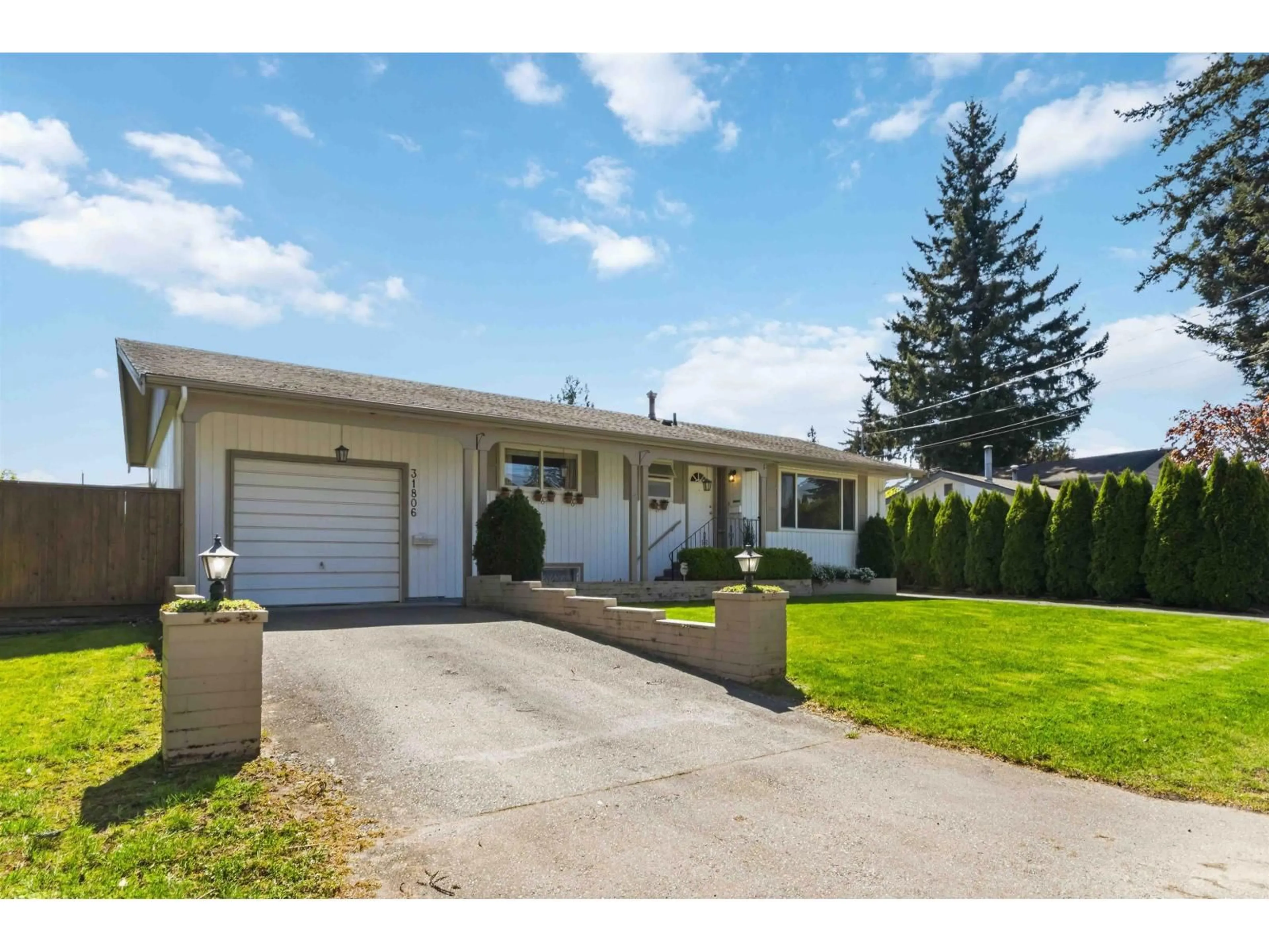 Home with vinyl exterior material, street for 31806 CARLSRUE AVENUE, Abbotsford British Columbia V2T2J5