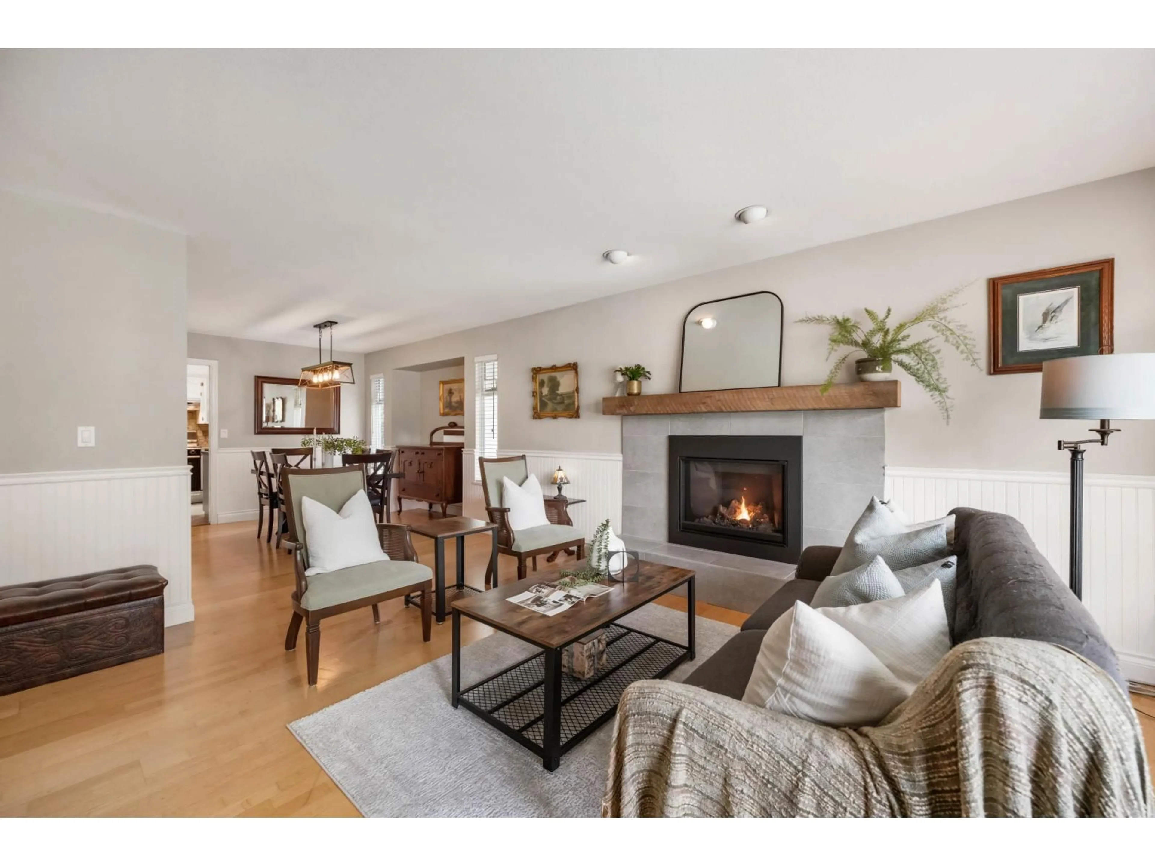 Living room with furniture, wood/laminate floor for 27136 25A AVENUE, Langley British Columbia V4W3N4