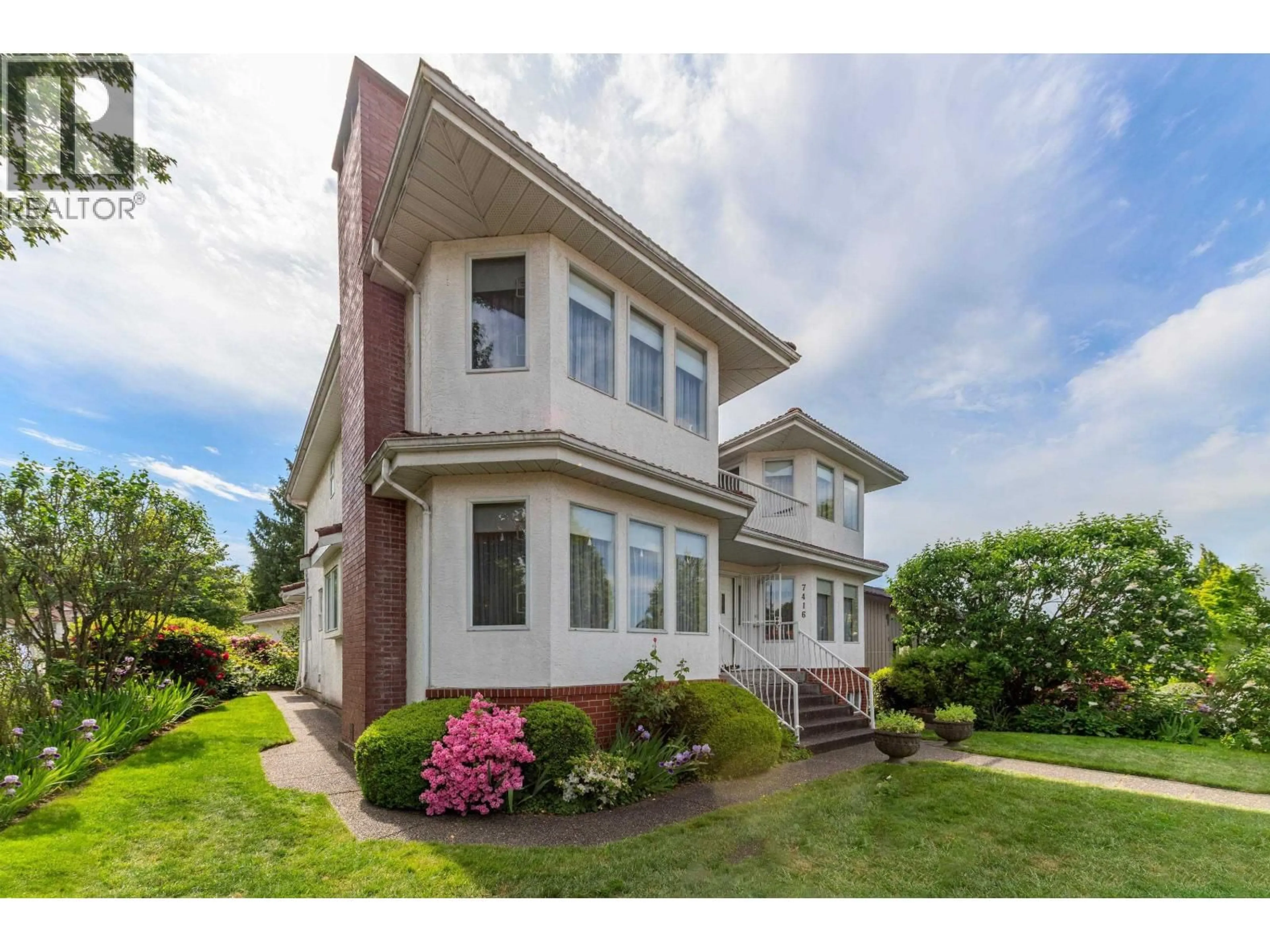 Home with vinyl exterior material, street for 7416 JASPER CRESCENT, Vancouver British Columbia V5P3S5