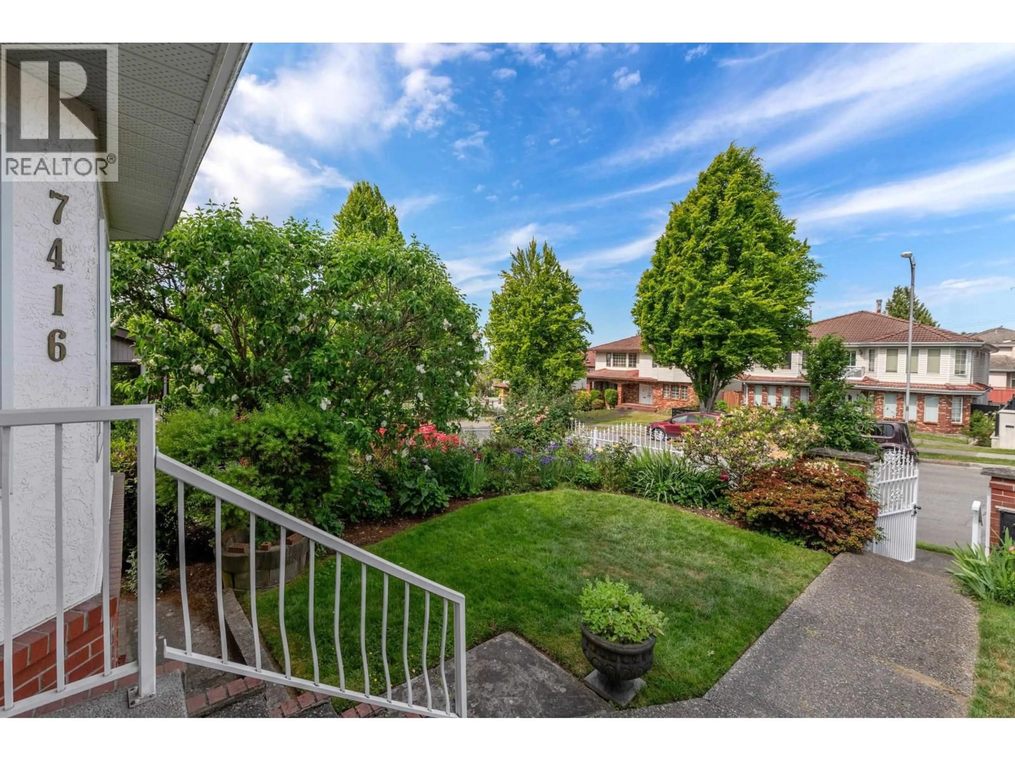 A pic from outside/outdoor area/front of a property/back of a property/a pic from drone, street for 7416 JASPER CRESCENT, Vancouver British Columbia V5P3S5