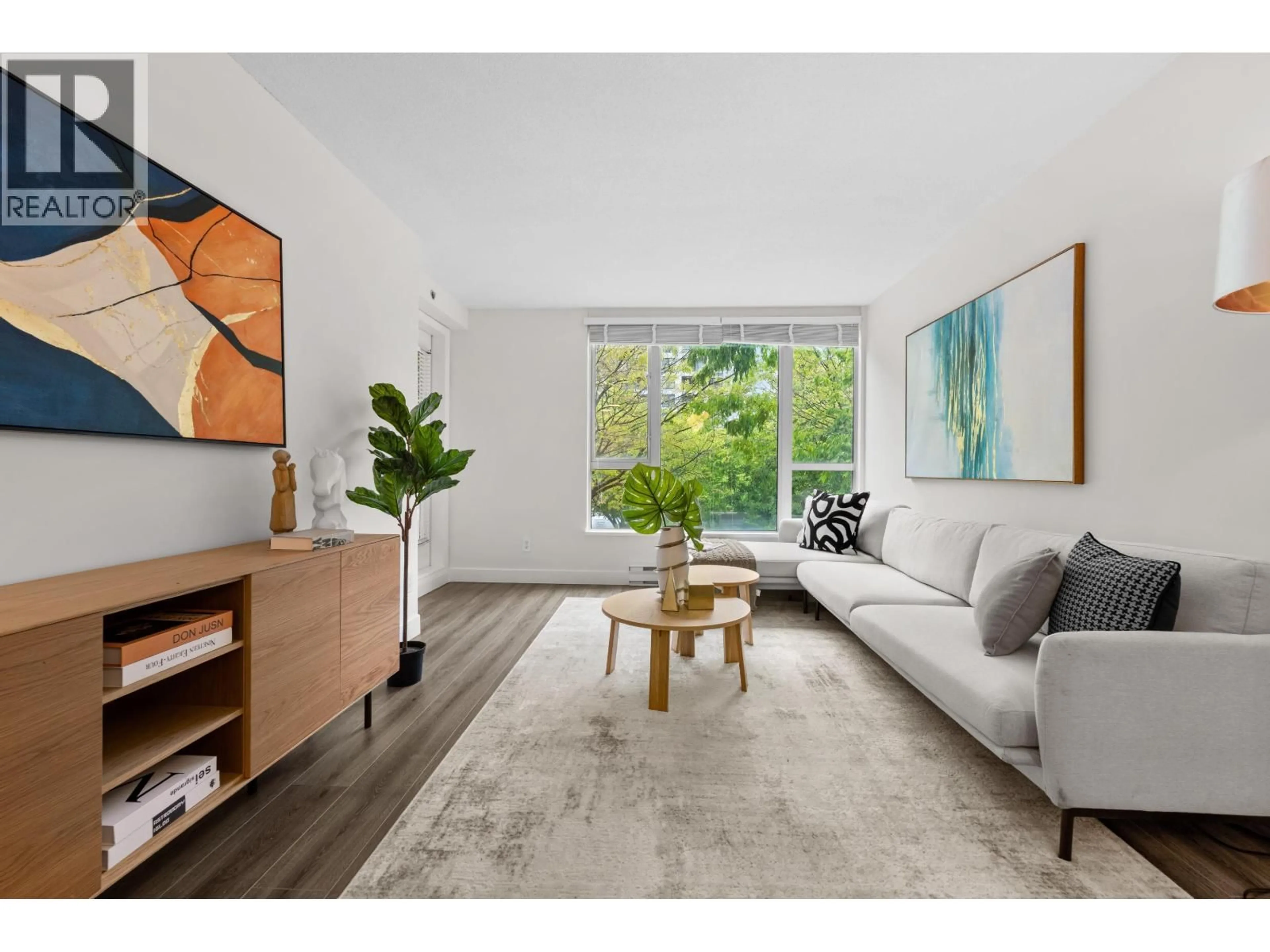 Living room with furniture, unknown for 201 - 5189 GASTON STREET, Vancouver British Columbia V5R6C7