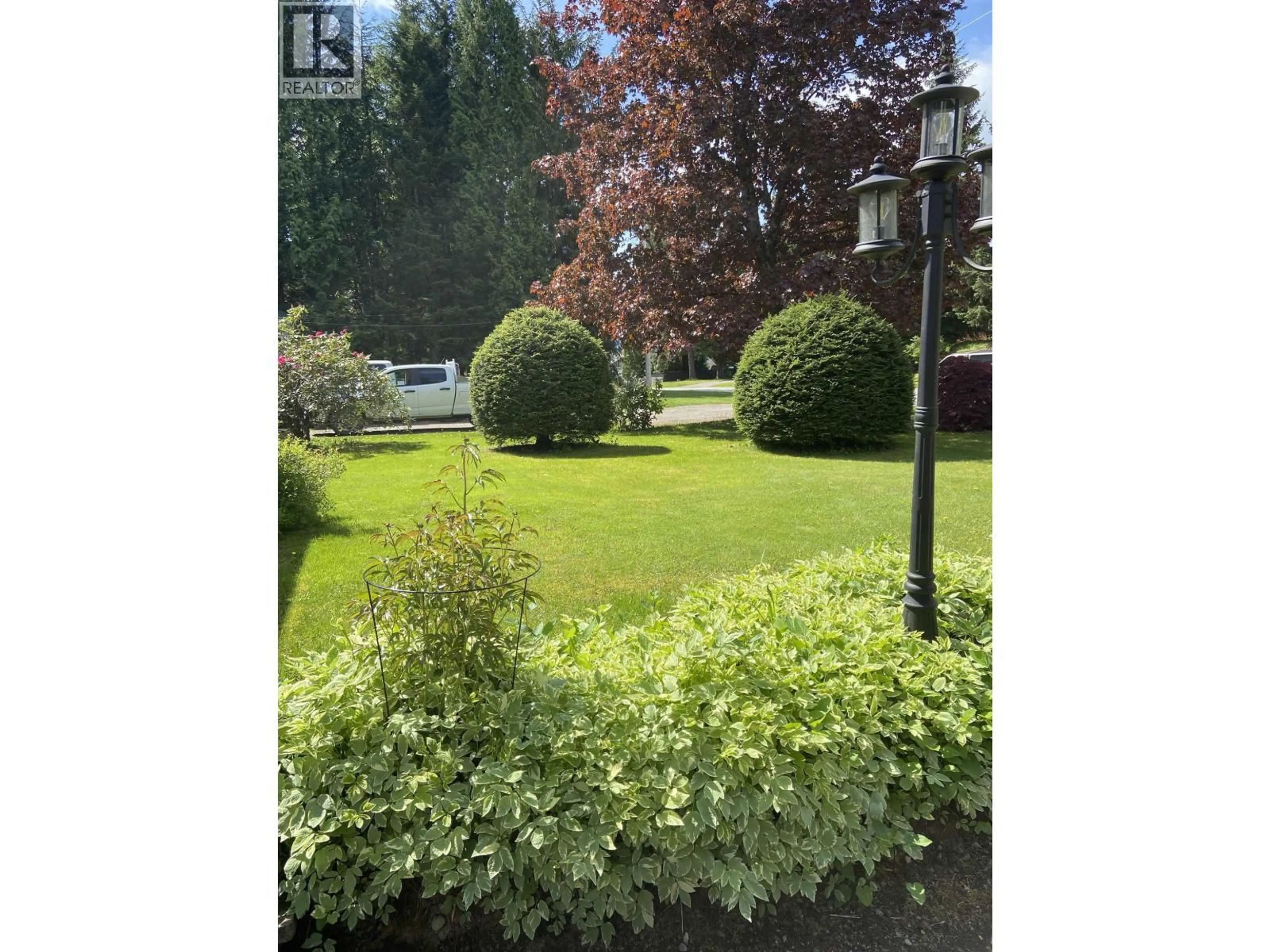 A pic from outside/outdoor area/front of a property/back of a property/a pic from drone, forest/trees view for 4012 MUNROE STREET, Terrace British Columbia V8G3C5