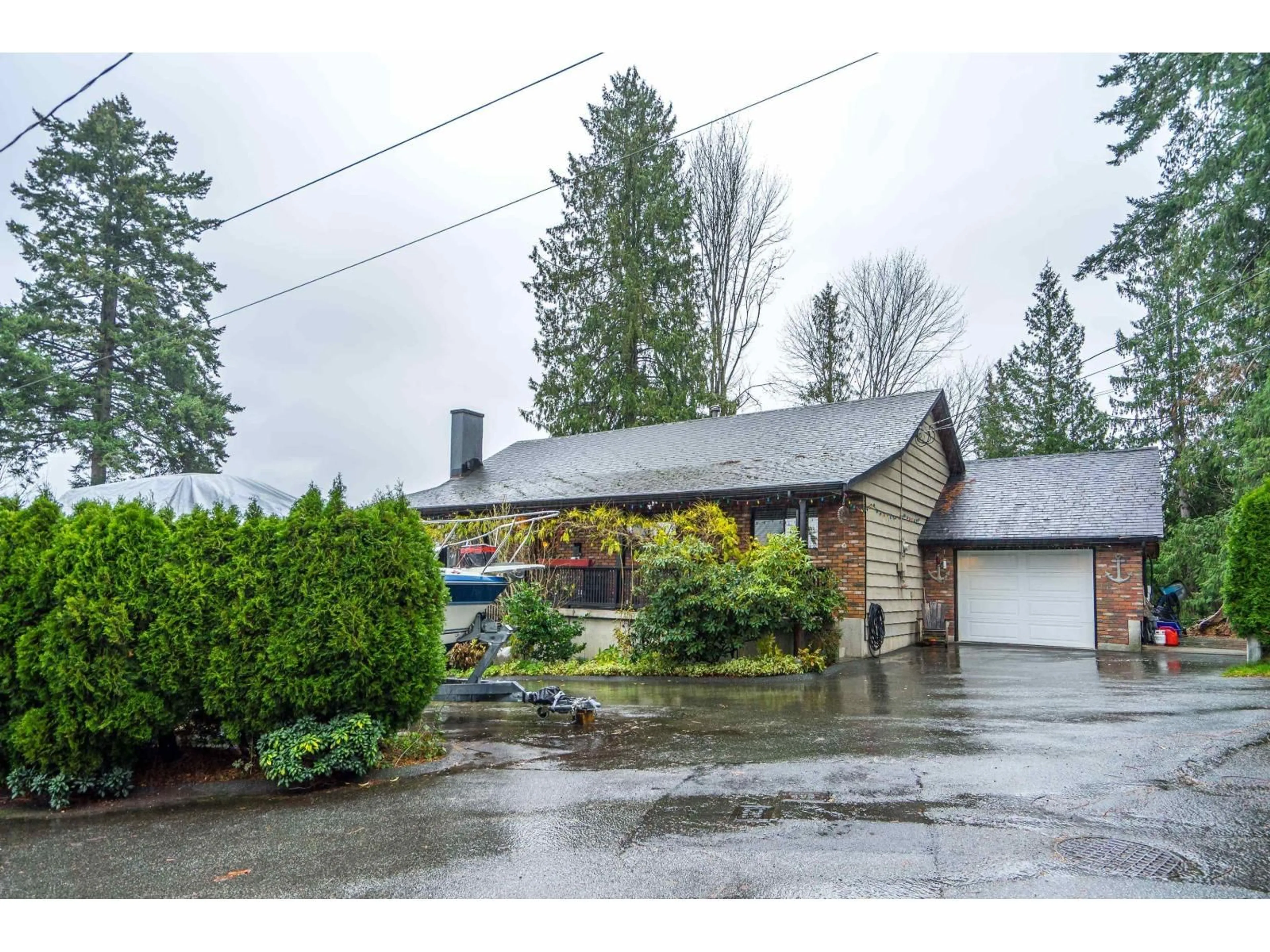 A pic from outside/outdoor area/front of a property/back of a property/a pic from drone, street for 9209 NORUM ROAD, Delta British Columbia V4C7B6