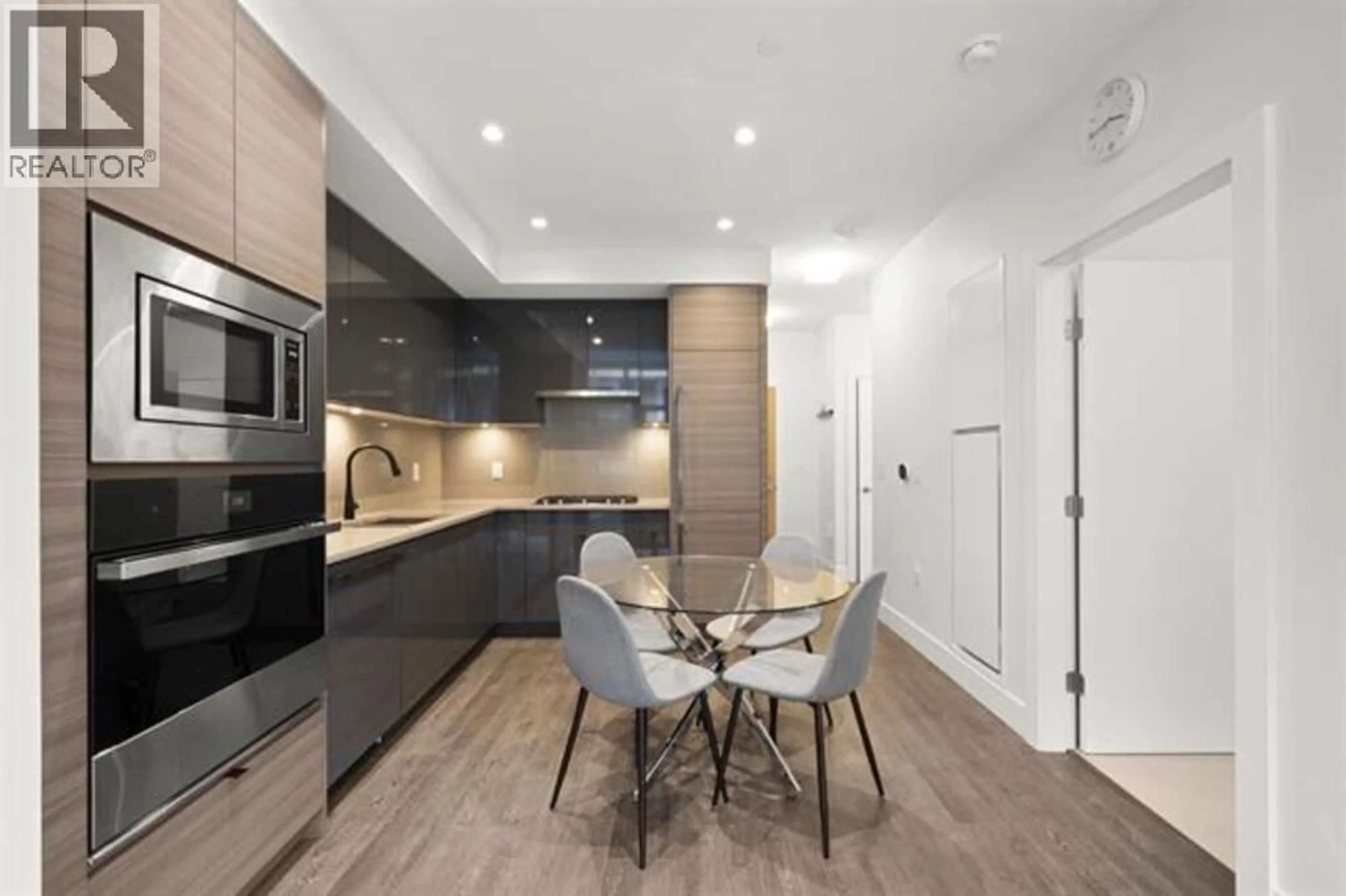 Contemporary kitchen, unknown for 408 - 3438 SAWMILL CRESCENT, Vancouver British Columbia V5S0E3