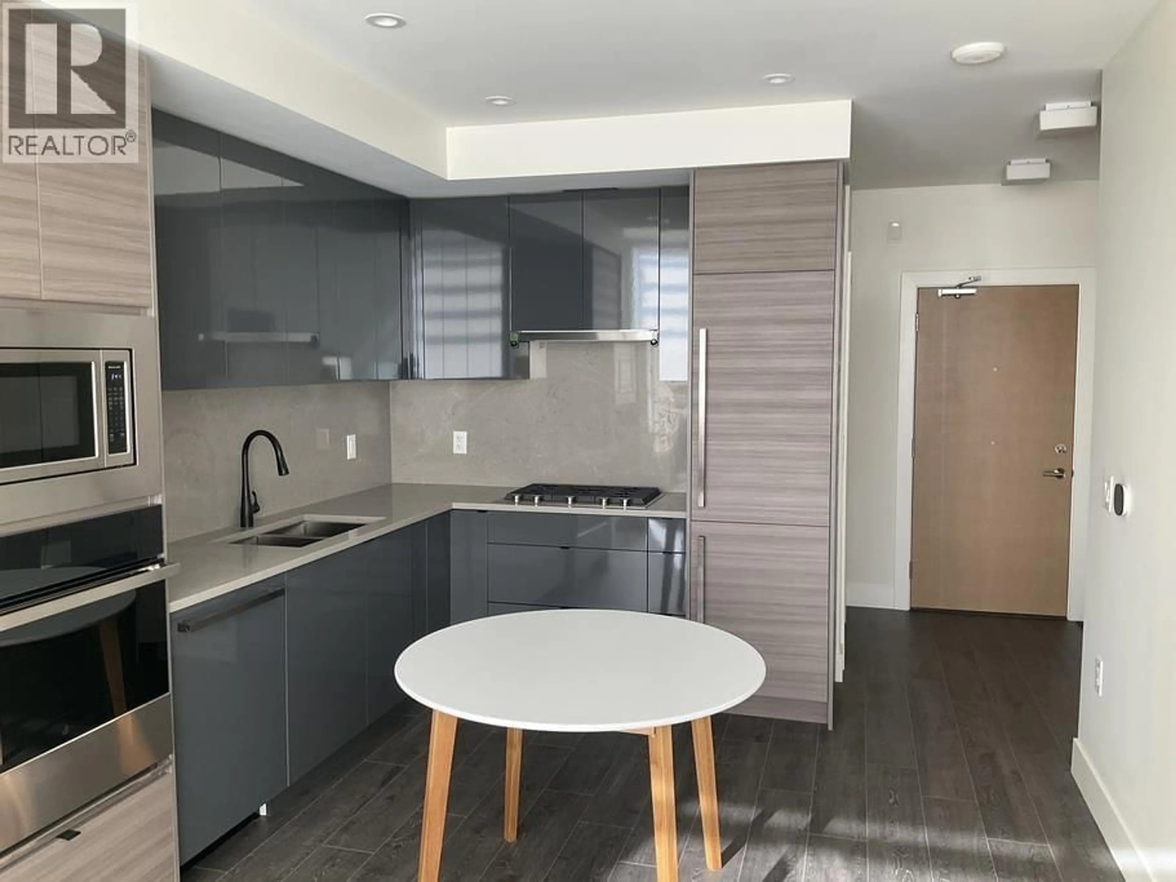 Open concept kitchen, unknown for 408 - 3438 SAWMILL CRESCENT, Vancouver British Columbia V5S0E3