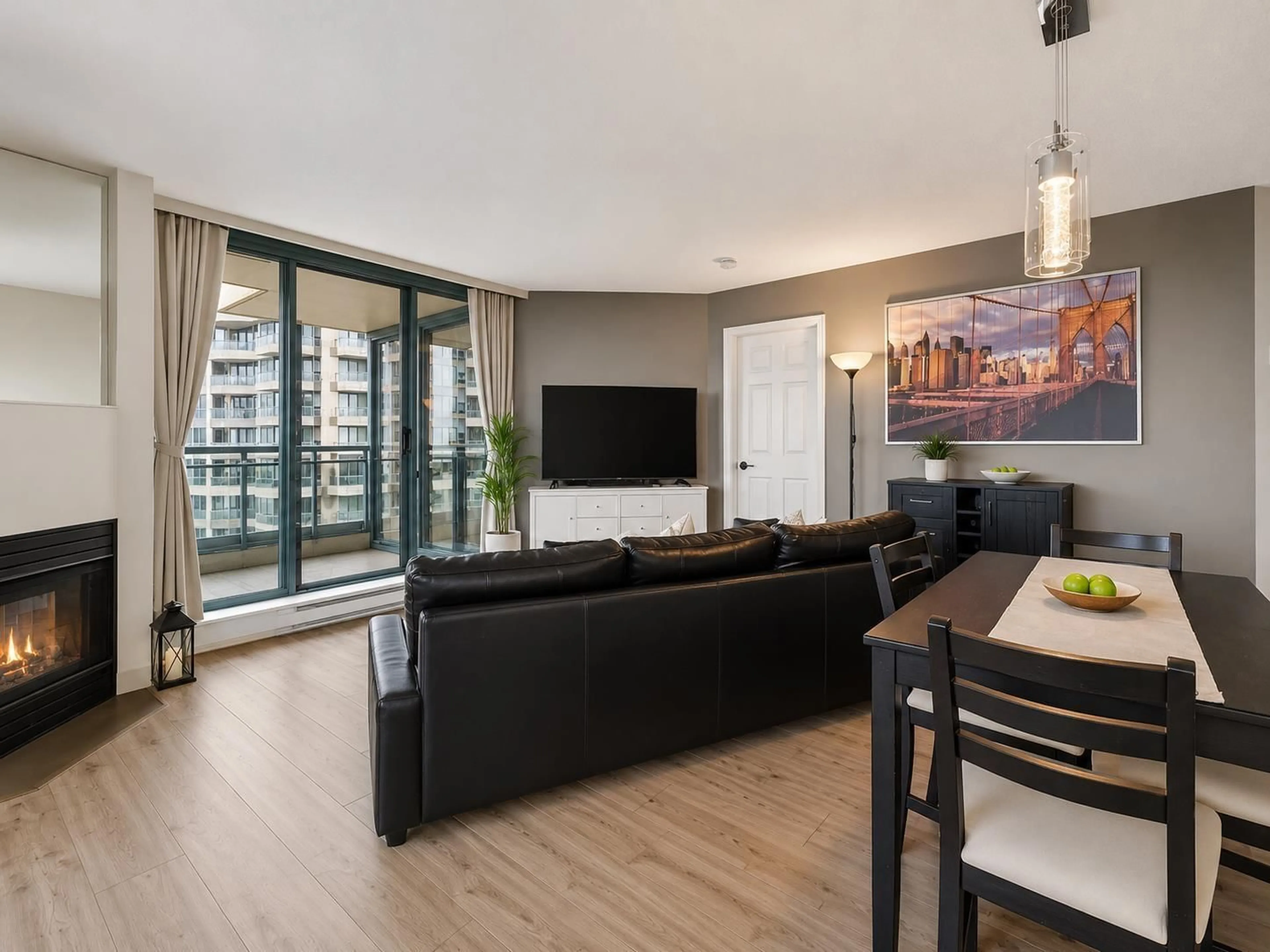 Living room with furniture, wood/laminate floor for 1207 - 13353 108 AVENUE, Surrey British Columbia V3T5T5