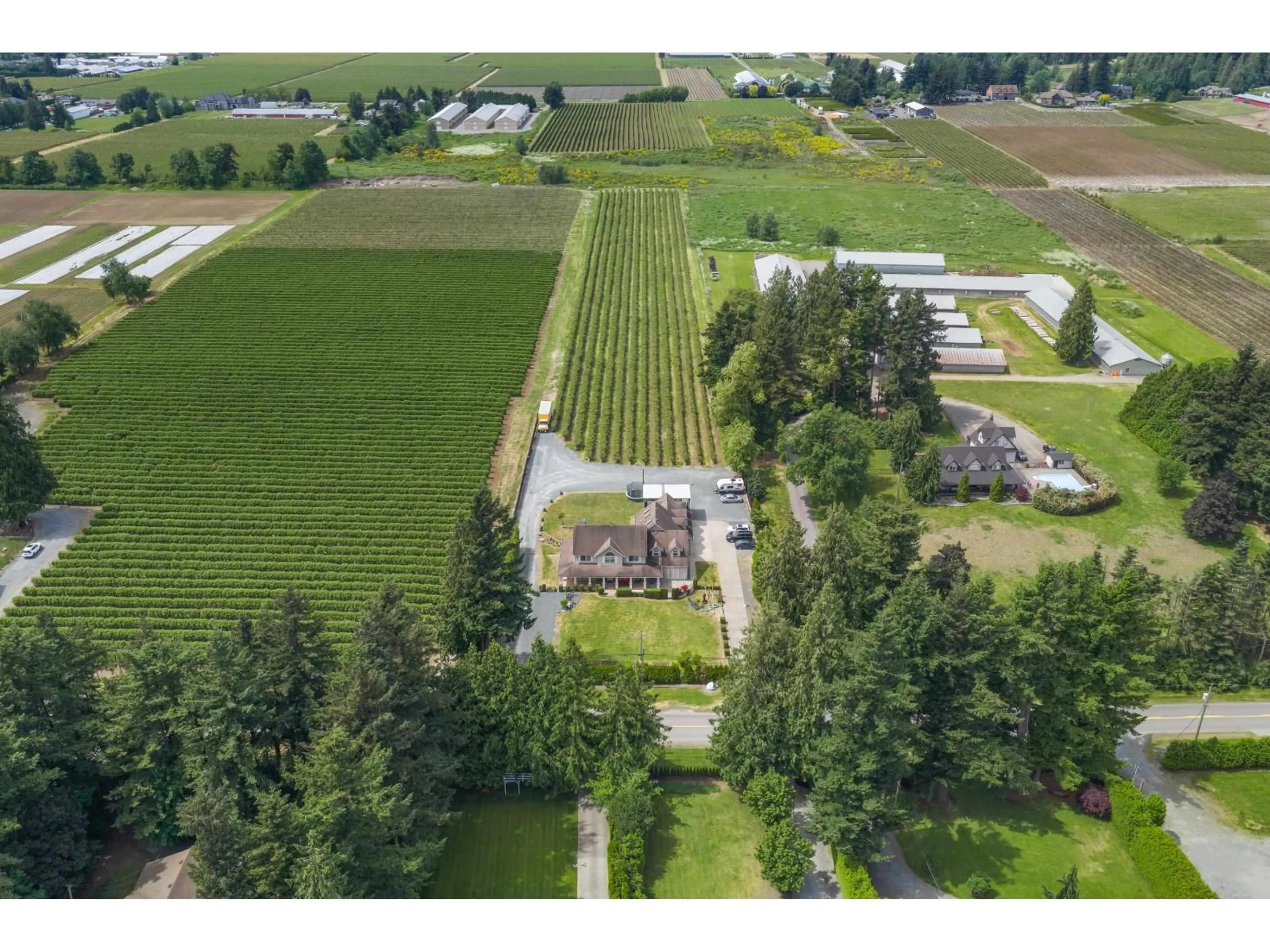 A pic from outside/outdoor area/front of a property/back of a property/a pic from drone, mountain view for 1189 GLADWIN ROAD, Abbotsford British Columbia V2T5Y4