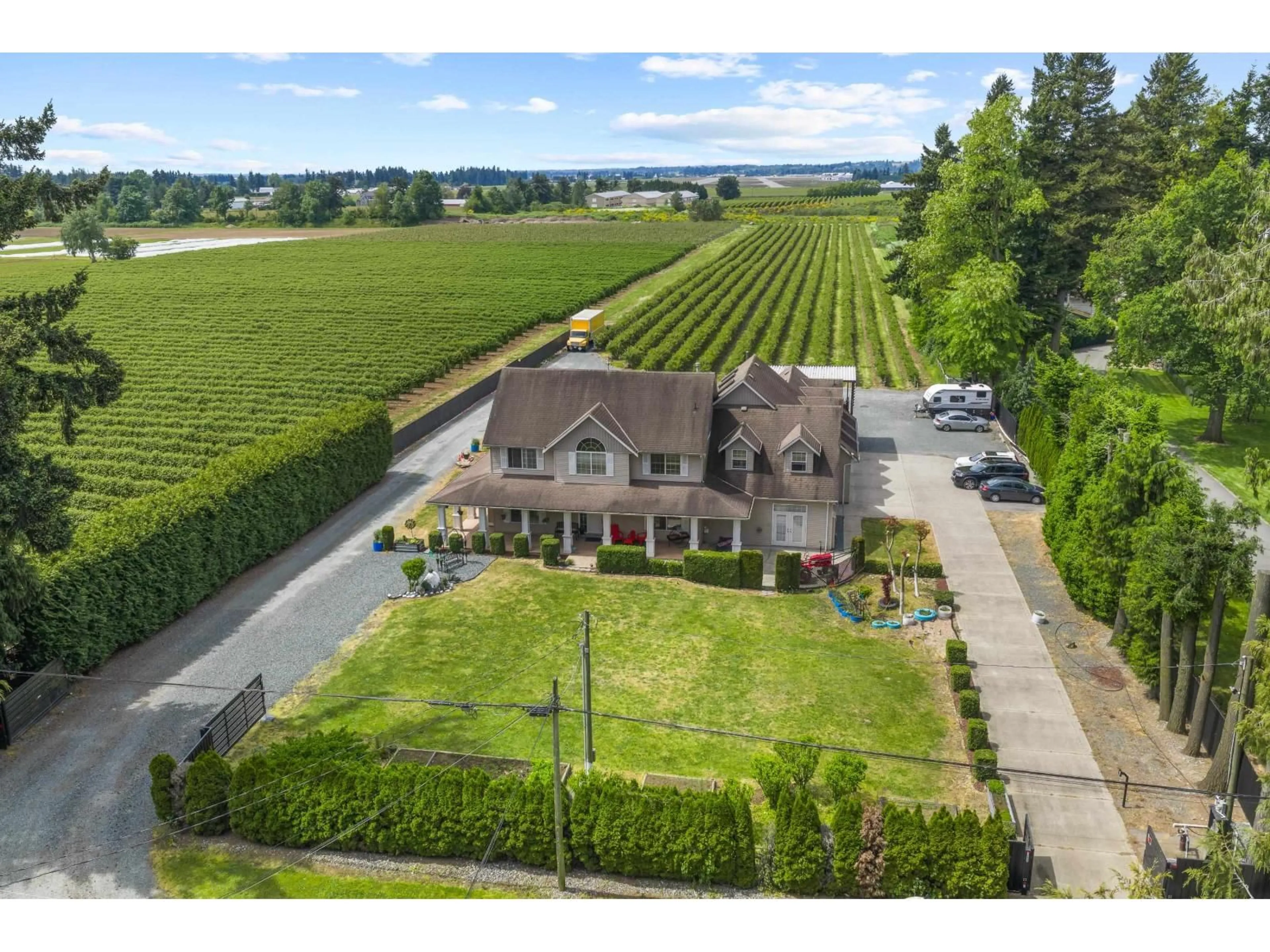 A pic from outside/outdoor area/front of a property/back of a property/a pic from drone, street for 1189 GLADWIN ROAD, Abbotsford British Columbia V2T5Y4
