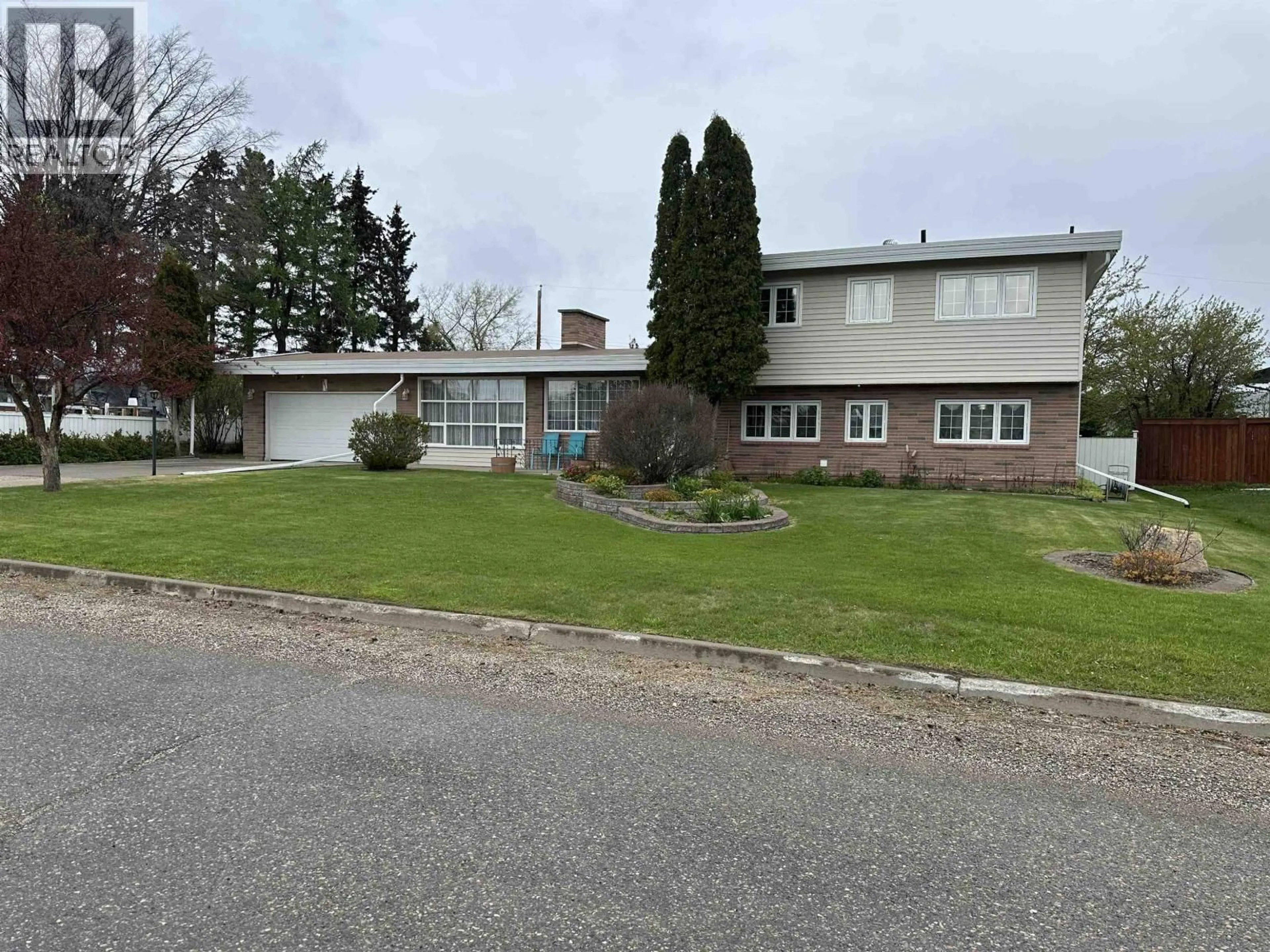 A pic from outside/outdoor area/front of a property/back of a property/a pic from drone, unknown for 9616 106 AVENUE, Fort St. John British Columbia V1J2N7