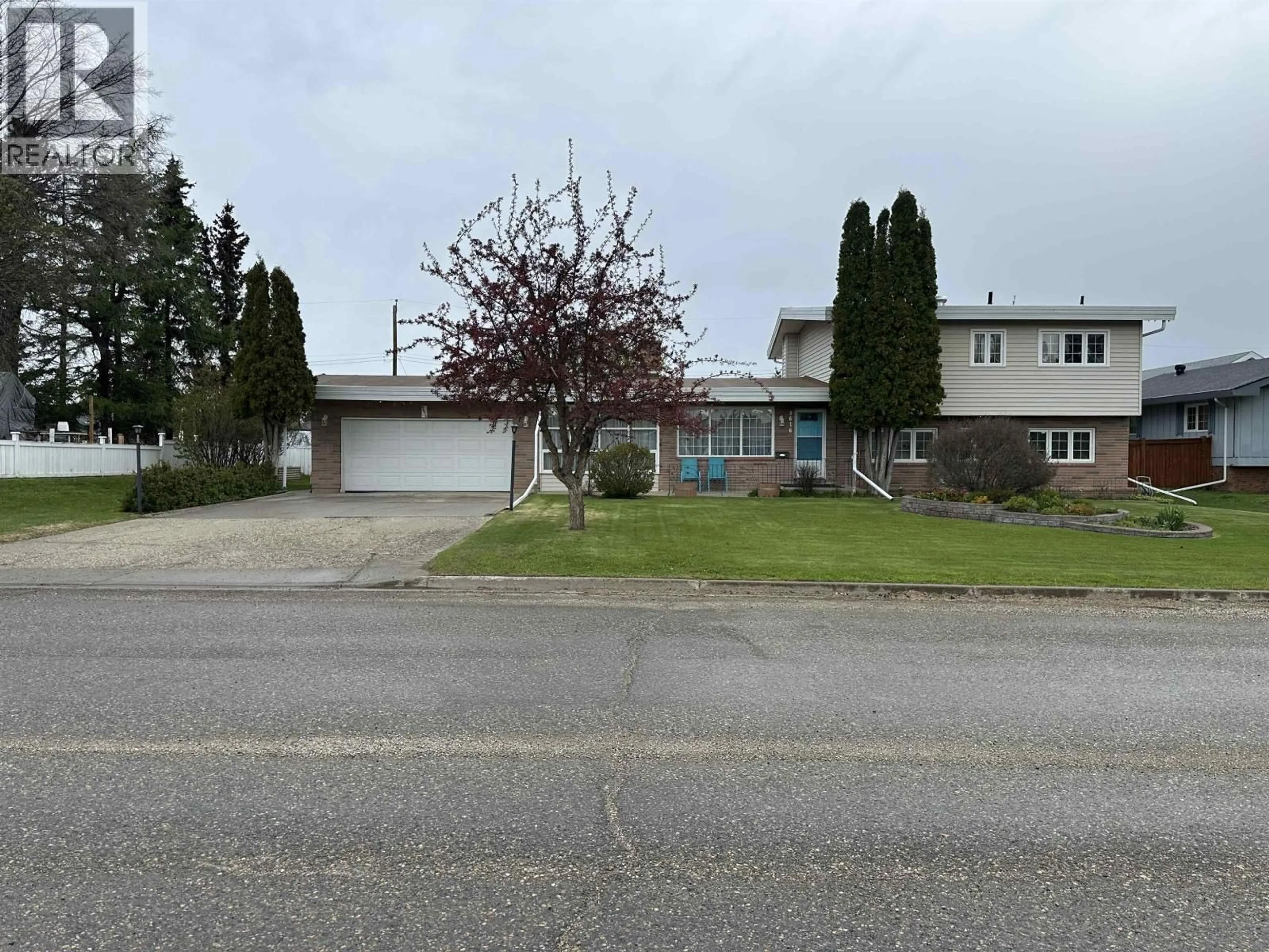 A pic from outside/outdoor area/front of a property/back of a property/a pic from drone, street for 9616 106 AVENUE, Fort St. John British Columbia V1J2N7