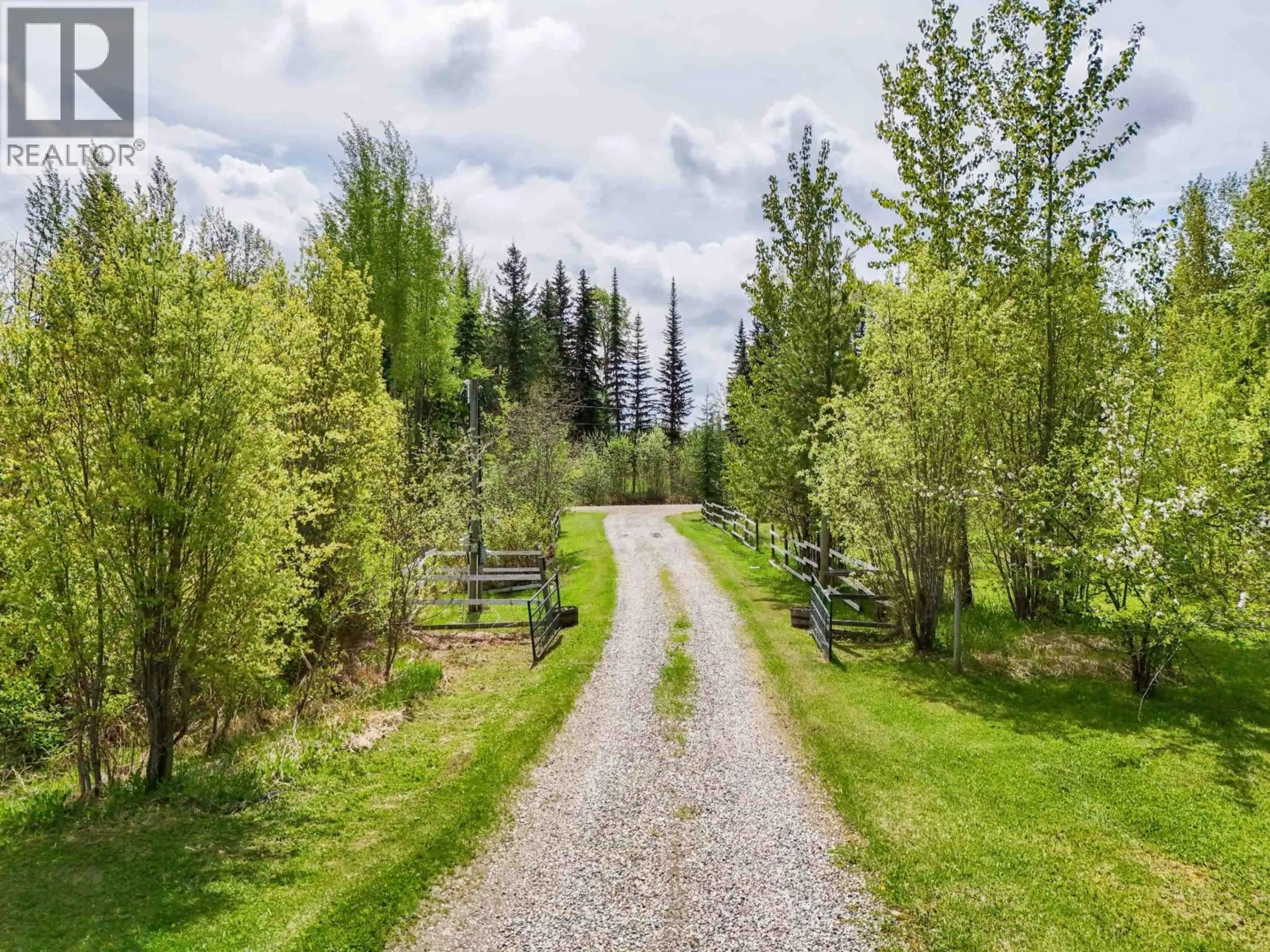A pic from outside/outdoor area/front of a property/back of a property/a pic from drone, forest/trees view for 3641 BLUERIDGE ROAD, Quesnel British Columbia V2J6J4