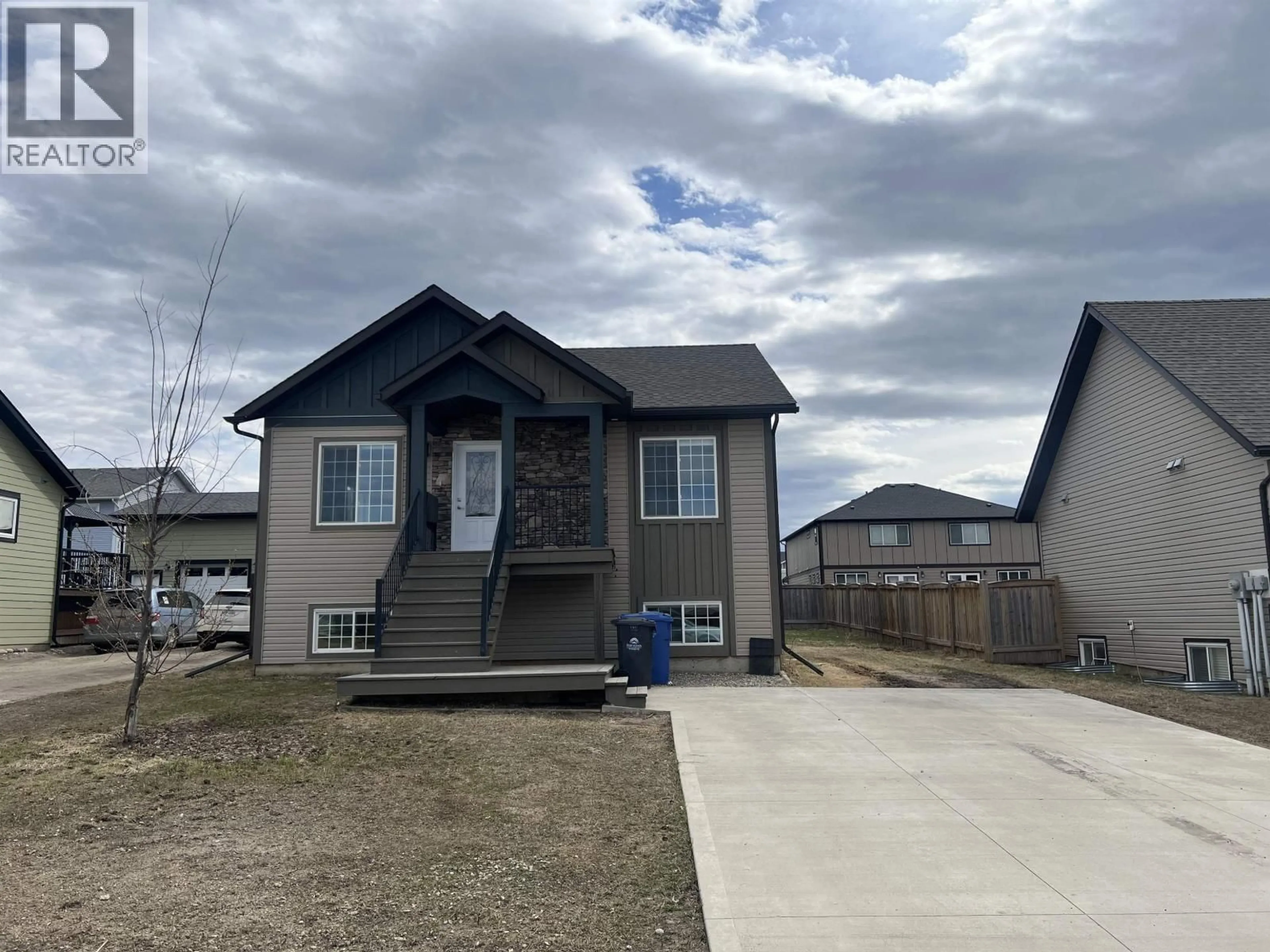 Home with vinyl exterior material, street for 11011 105 AVENUE, Fort St. John British Columbia V1J0L5